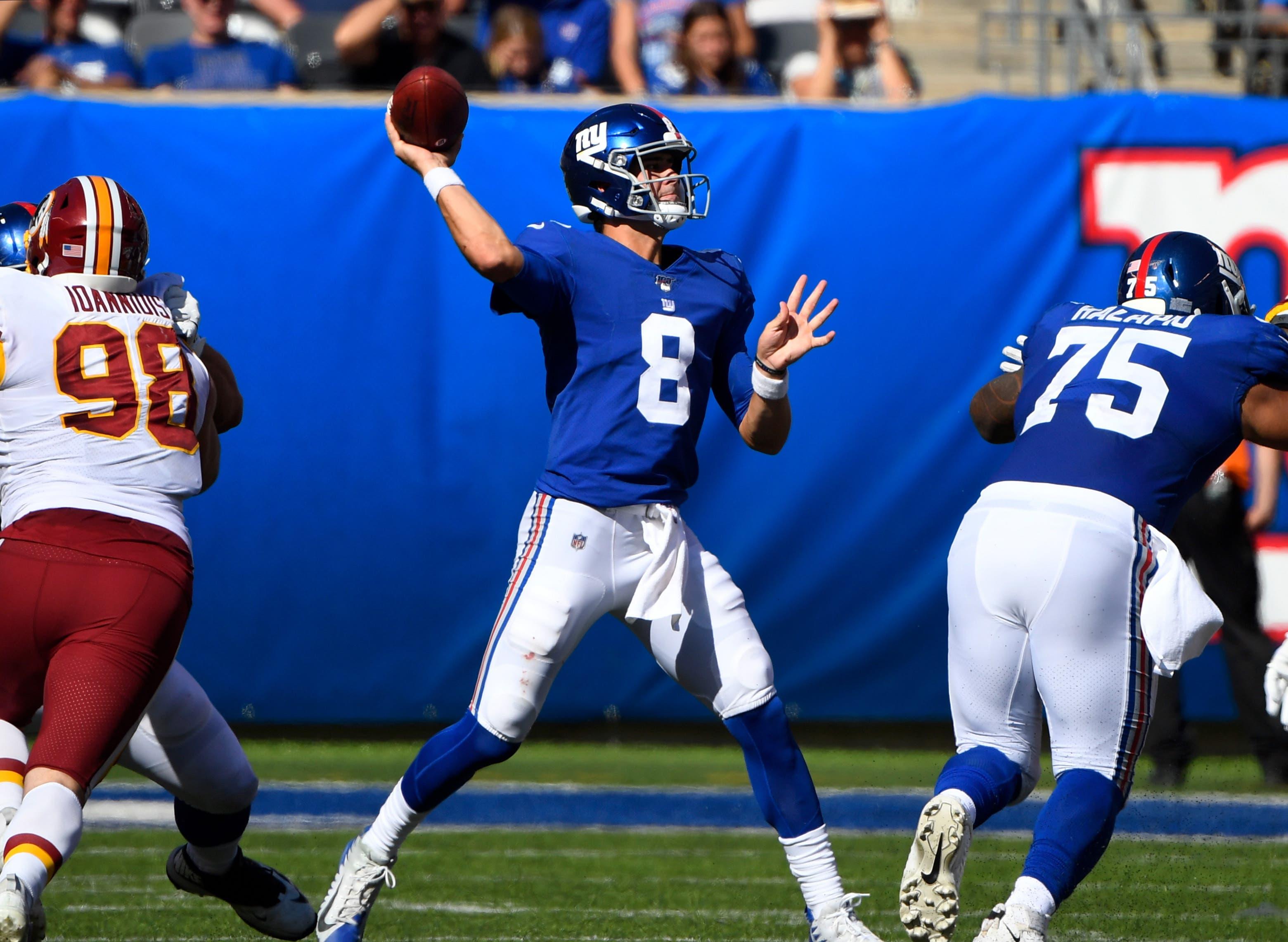 Sep 29, 2019; East Rutherford, NJ, USA; 
New York Giants quarterback Daniel Jones (8) throws the ball in the second half against the Washington Redskins at MetLife Stadium. Mandatory Credit: Robert Deutsch-USA TODAY Sports / Robert Deutsch