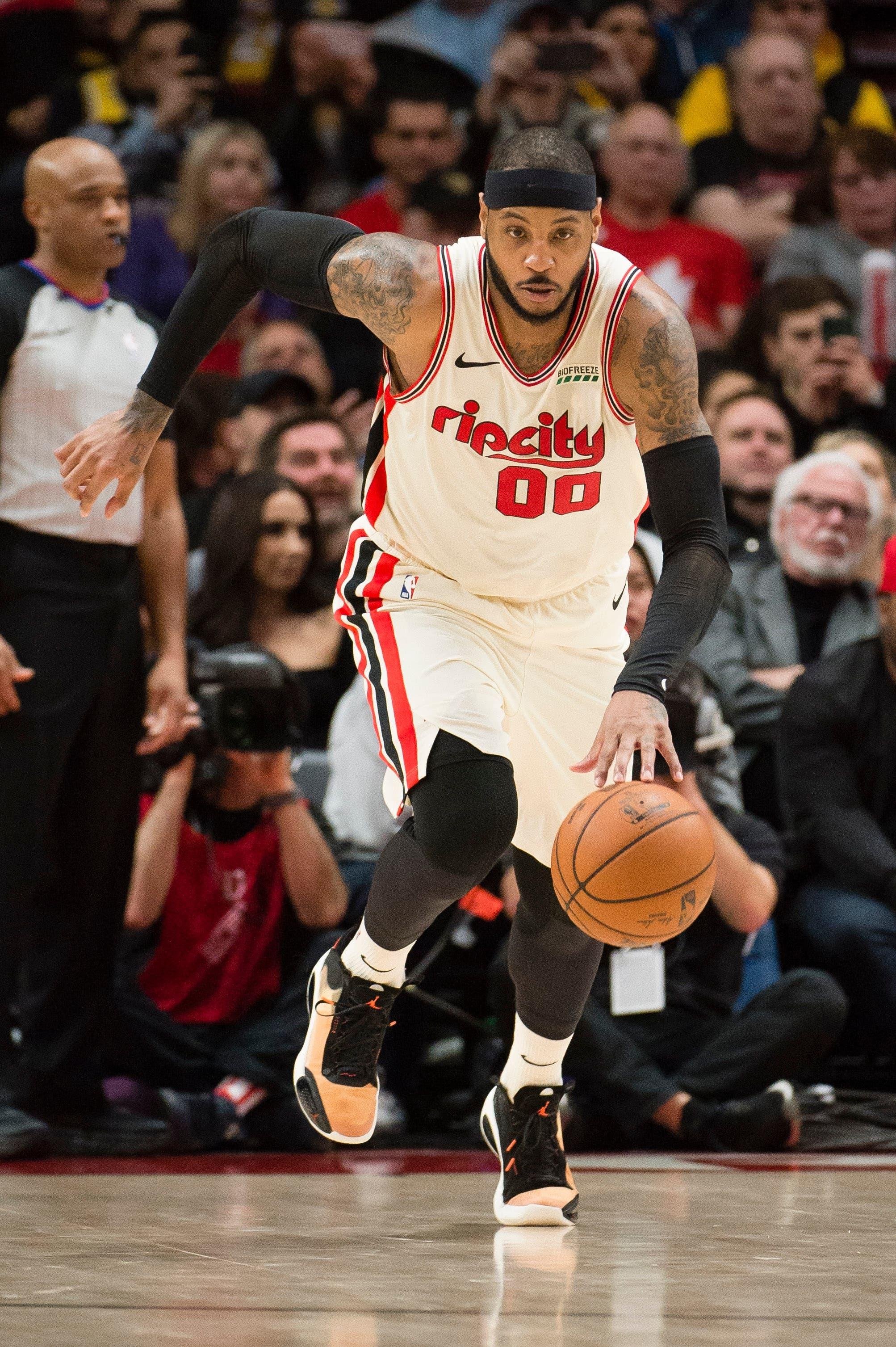 Dec 6, 2019; Portland, OR, USA; Portland Trail Blazers forward Carmelo Anthony (00) dribble up court during the second half against the Portland Trail Blazers at Moda Center. The Los Angeles Lakers beat the Portland Trail Blazers 136-113. Mandatory Credit: Troy Wayrynen-USA TODAY Sports / Troy Wayrynen