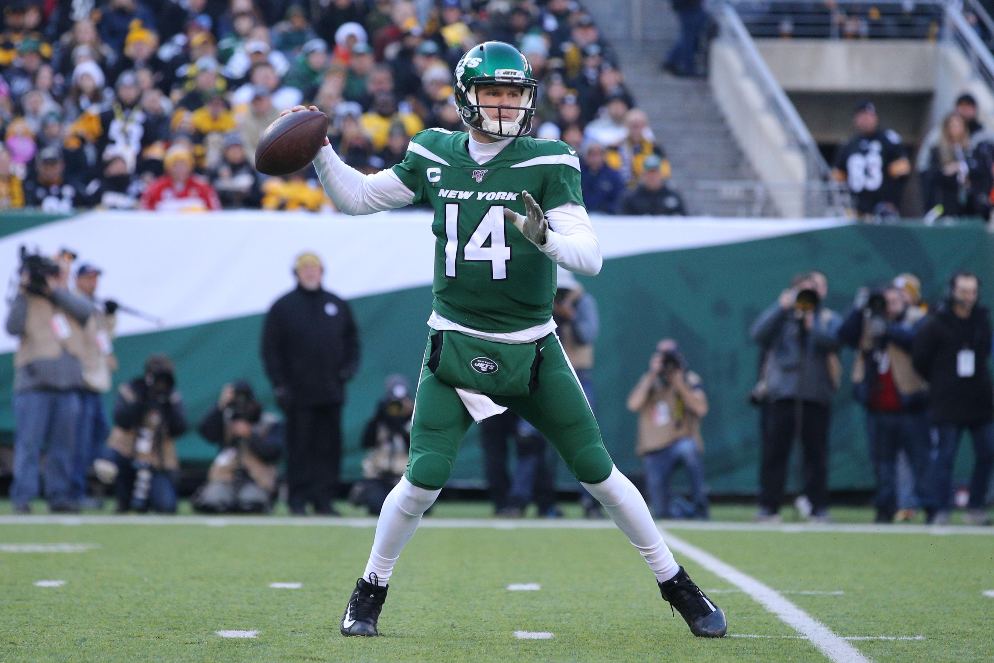 Dec 22, 2019; East Rutherford, New Jersey, USA; New York Jets quarterback Sam Darnold (14) drops back to pass against the Pittsburgh Steelers during the second quarter at MetLife Stadium. Mandatory Credit: Brad Penner-USA TODAY Sports