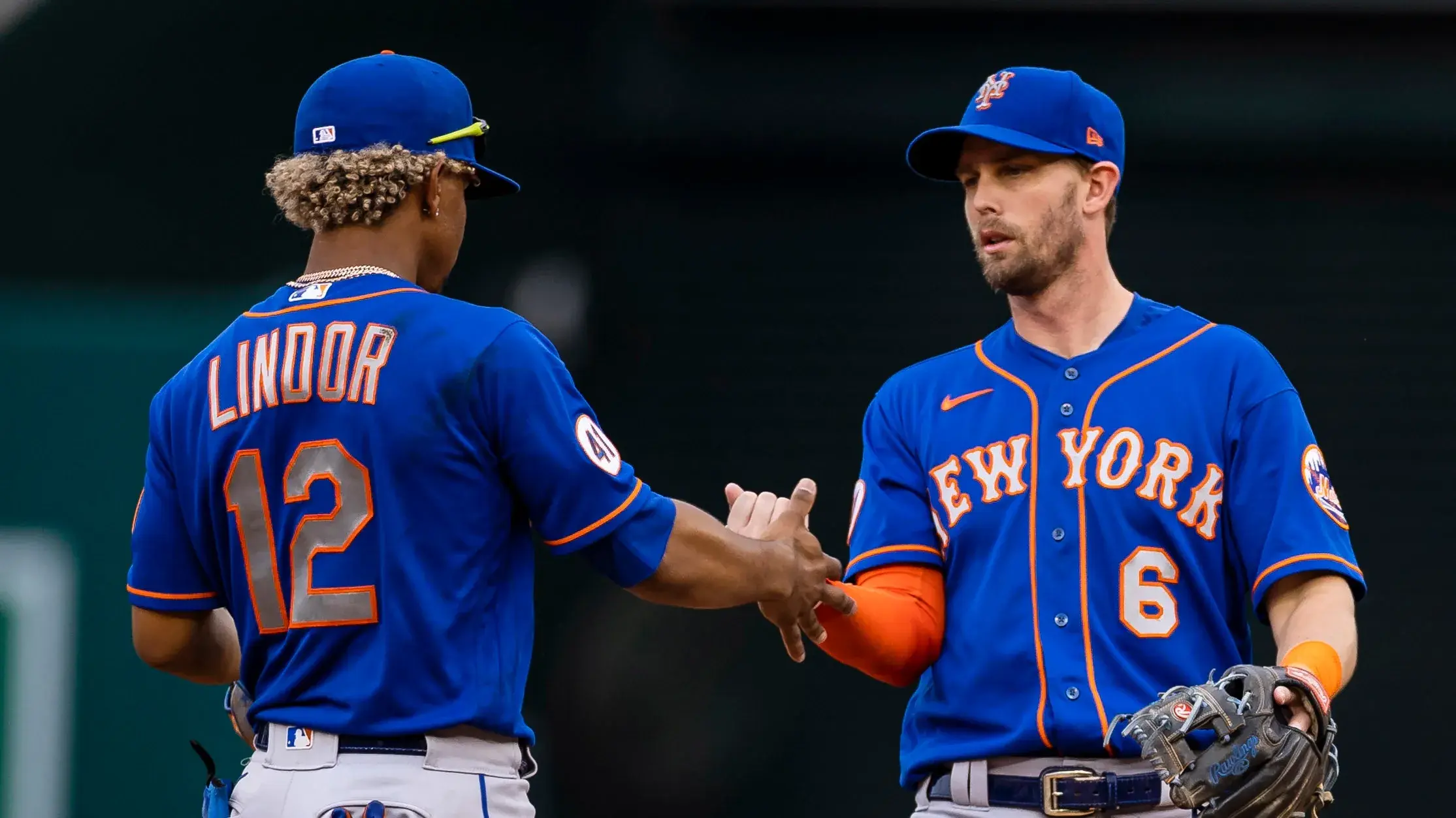 Sep 5, 2021; Washington, District of Columbia, USA; New York Mets shortstop Francisco Lindor (12) celebrates with left fielder Jeff McNeil (6) after the game against the Washington Nationals at Nationals Park. / Scott Taetsch-USA TODAY Sports