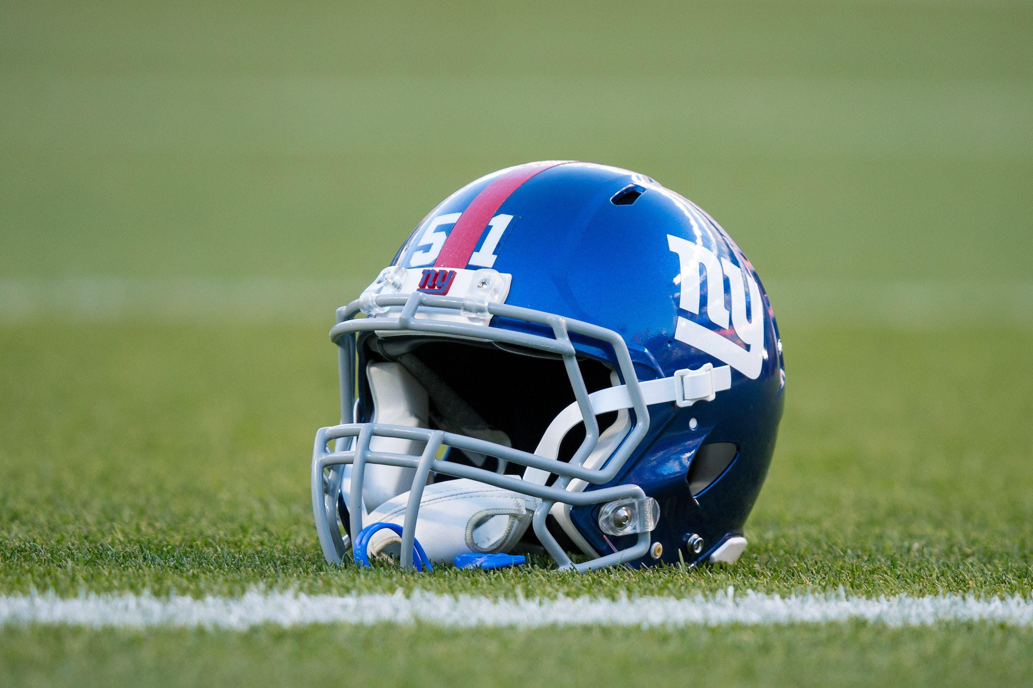 Oct 15, 2017; Denver, CO, USA; A general view of a New York Giants helmet on the turf before the game against the Denver Broncos at Sports Authority Field at Mile High. Mandatory Credit: Isaiah J. Downing-USA TODAY Sports / Isaiah J. Downing