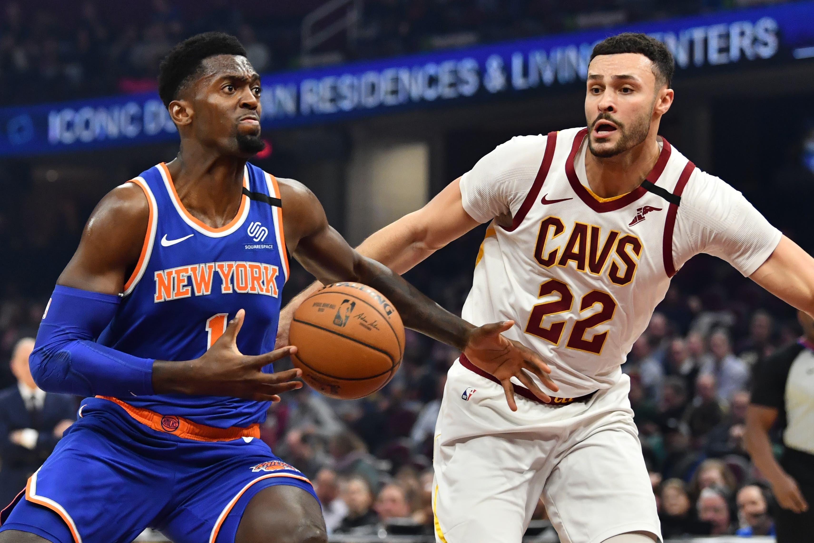 Feb 3, 2020; Cleveland, Ohio, USA; New York Knicks forward Bobby Portis (1) drives to the basket against Cleveland Cavaliers forward Larry Nance Jr. (22) during the first half at Rocket Mortgage FieldHouse. Mandatory Credit: Ken Blaze-USA TODAY Sports / Ken Blaze