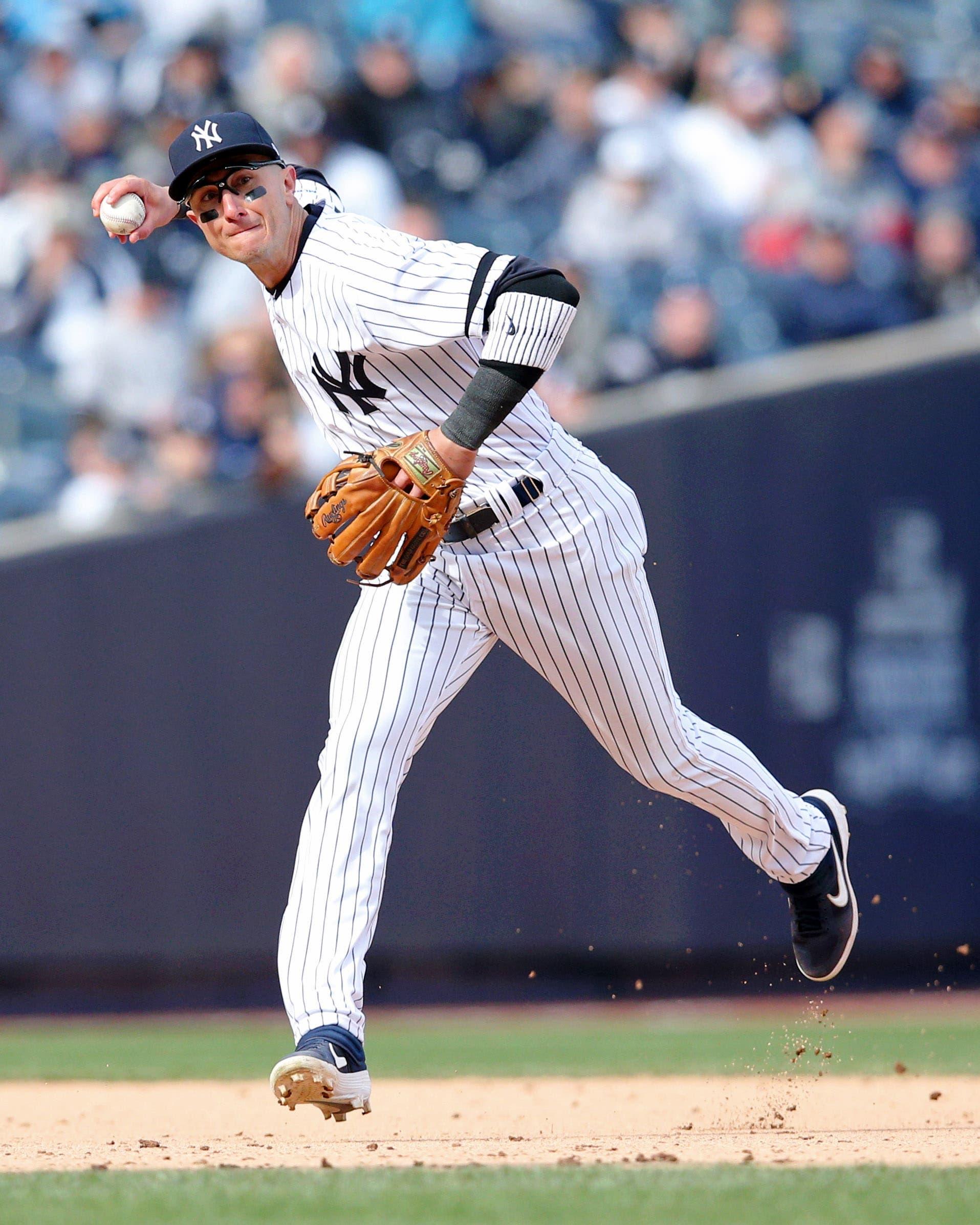 New York Yankees shortstop Troy Tulowitzki throws to first base on a ball hit by Baltimore Orioles infielder Hanser Alberto during the ninth inning at Yankee Stadium. / Brad Penner/USA TODAY Sports