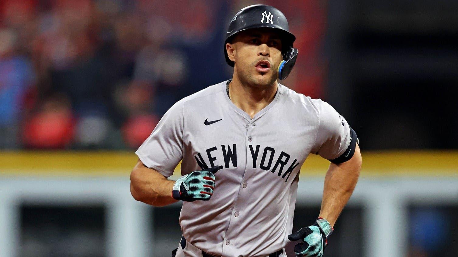 Oct 19, 2024; Cleveland, Ohio, USA; New York Yankees designated hitter Giancarlo Stanton (27) runs the bases after hitting a two run home run during the sixth inning against the Cleveland Guardians during game five of the ALCS for the 2024 MLB playoffs at Progressive Field.