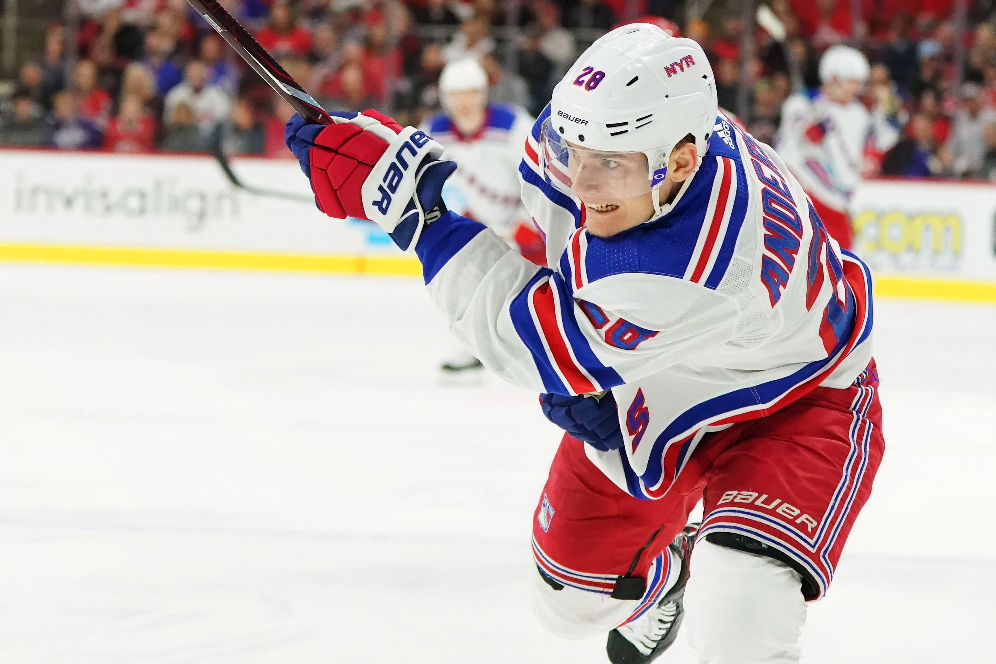 Nov 7, 2019; Raleigh, NC, USA; New York Rangers center Lias Andersson (28) takes a shot against the Carolina Hurricanes at PNC Arena. Mandatory Credit: James Guillory-USA TODAY Sports / James Guillory