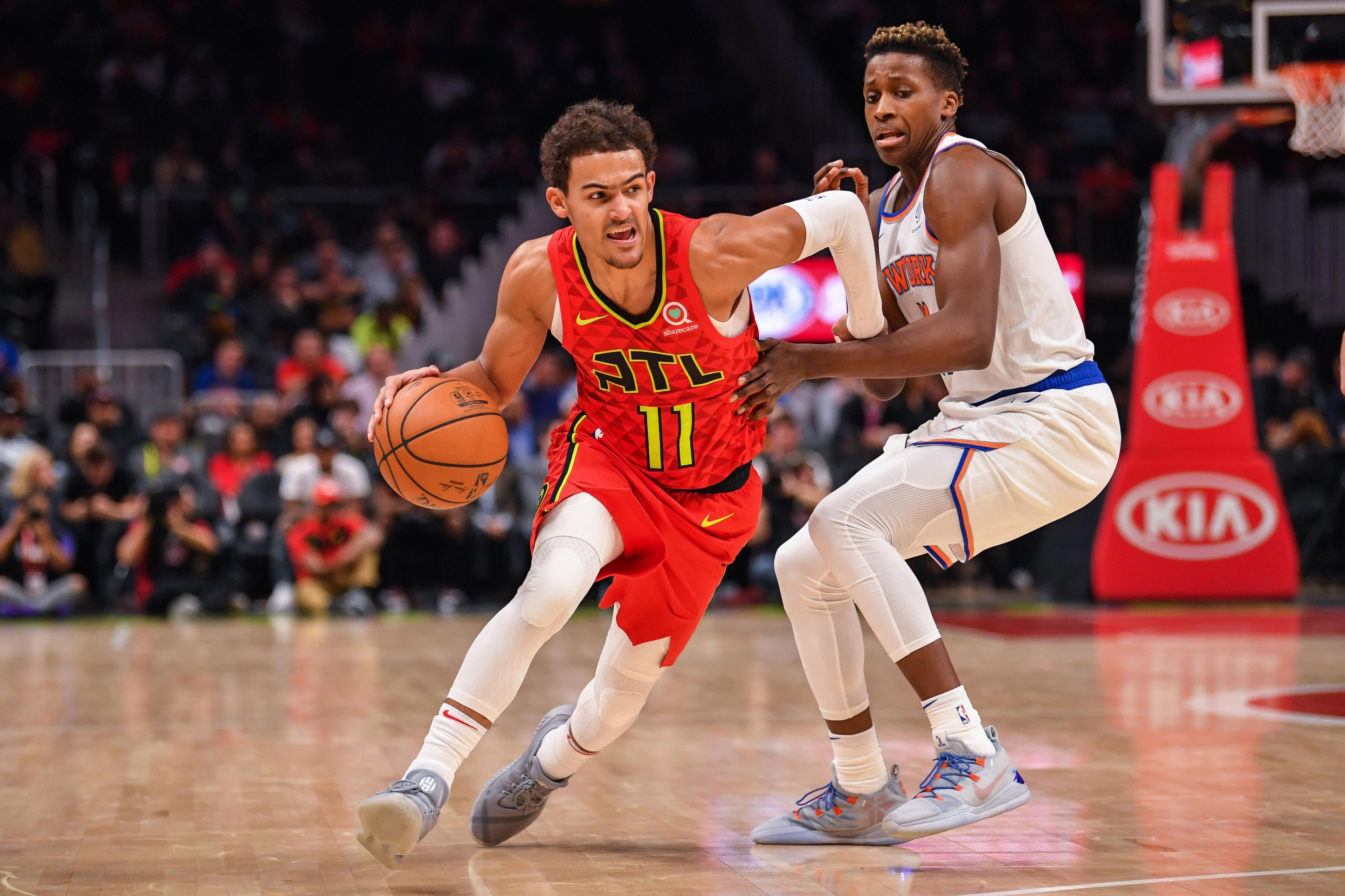 Nov 7, 2018; Atlanta, GA, USA; Atlanta Hawks guard Trae Young (11) dribbles around New York Knicks guard Frank Ntilikina (11) during the second half at State Farm Arena. Mandatory Credit: Dale Zanine-USA TODAY Sports / Dale Zanine