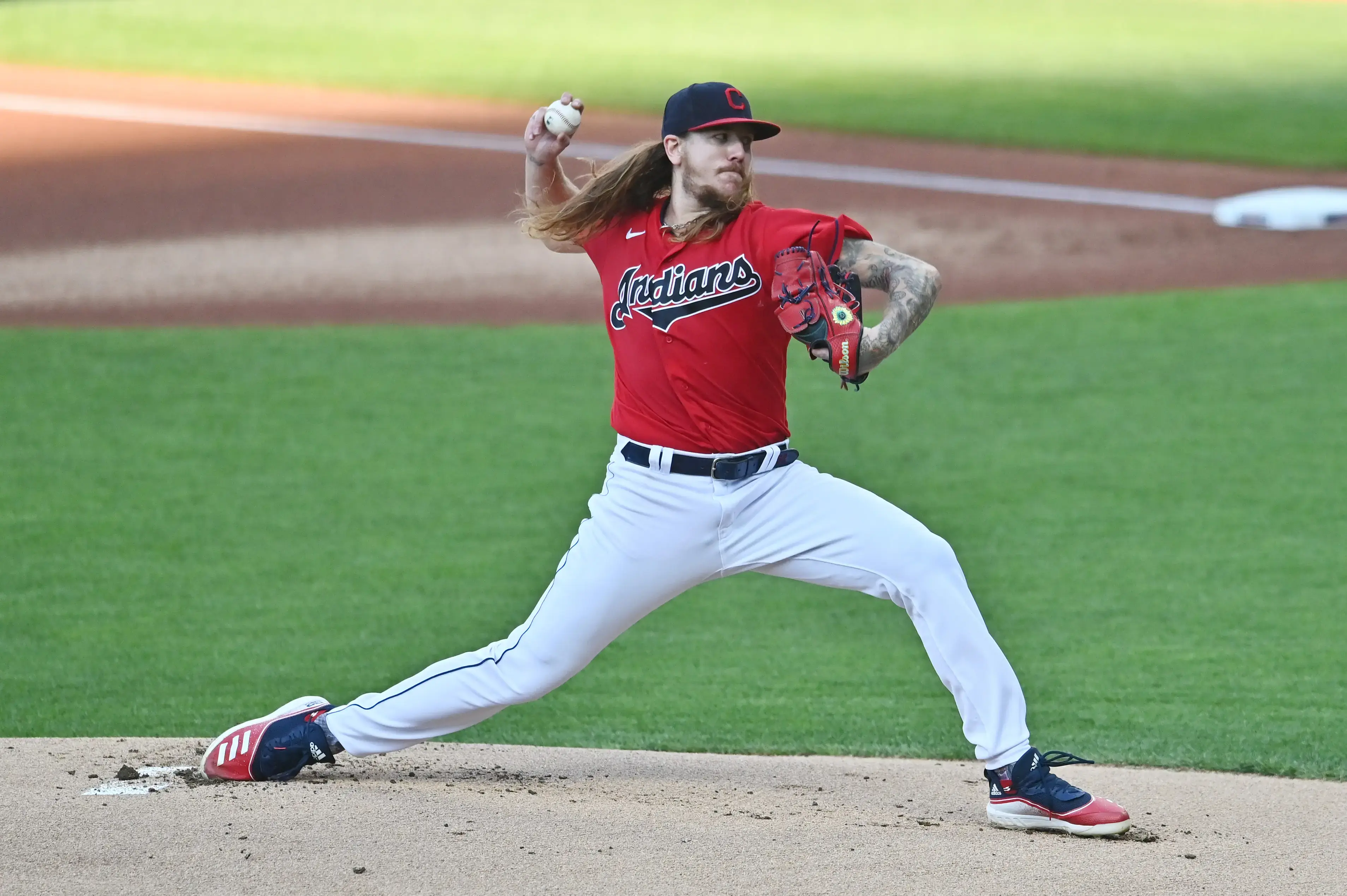 Aug 5, 2020; Cleveland, Ohio, USA; Cleveland Indians starting pitcher Mike Clevinger (52) throws a pitch during the first inning against the Cincinnati Reds at Progressive Field. / © Ken Blaze-USA TODAY Sports
