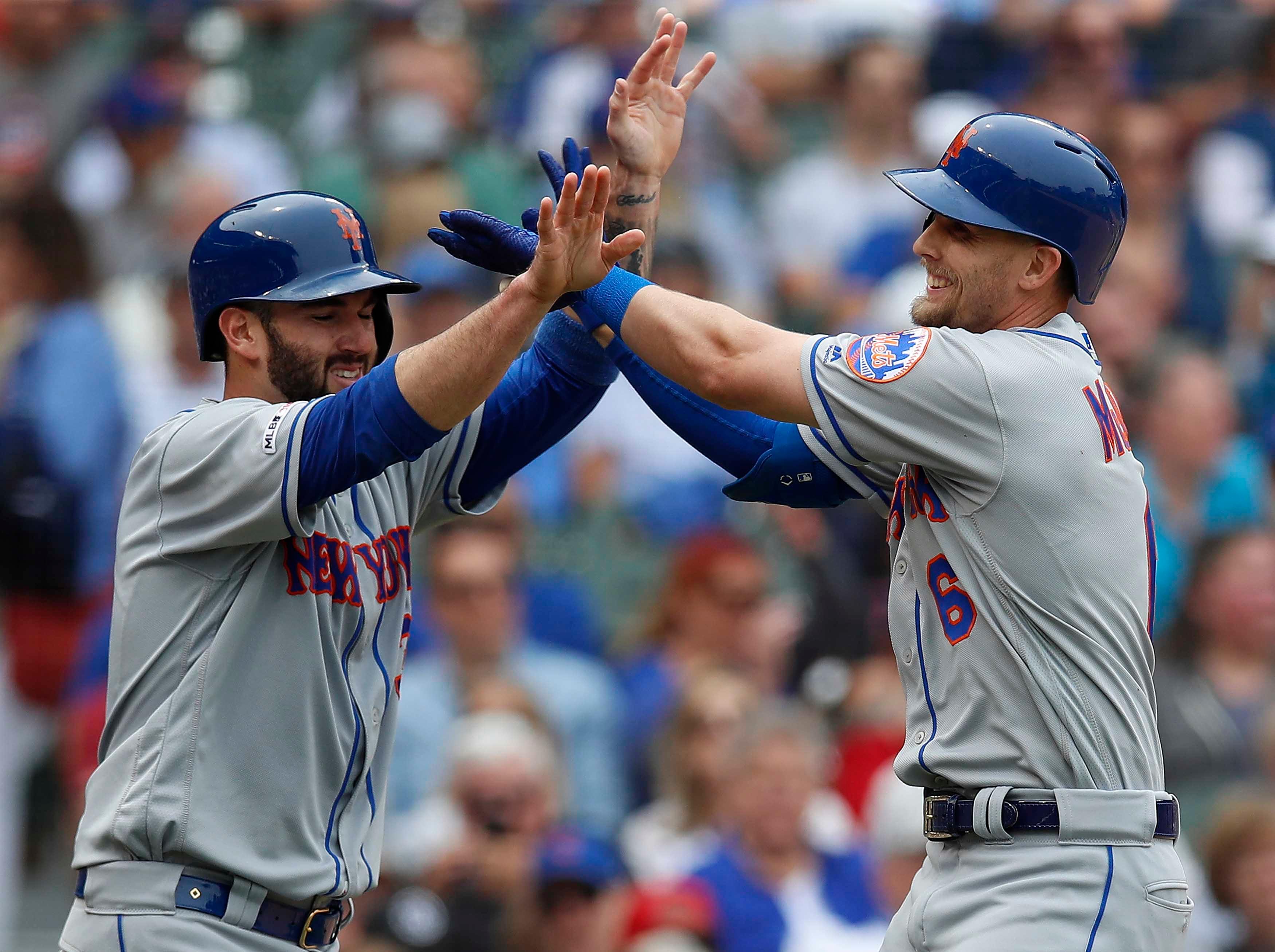 Jun 21, 2019; Chicago, IL, USA; dNew York Mets second baseman Jeff McNeil (6) celebrates his two-run home run against the Chicago Cubs with New York Mets catcher Tomas Nido (3) during the third inning at Wrigley Field. Mandatory Credit: Jim Young-USA TODAY Sports