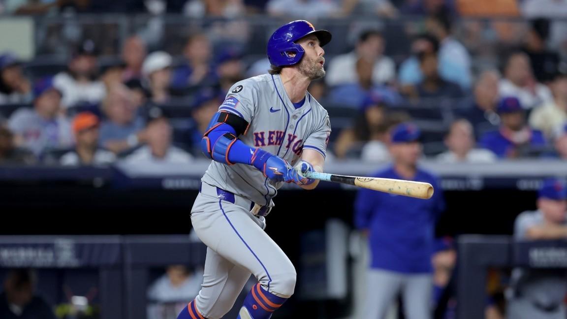 New York Mets second baseman Jeff McNeil (1) watches his two run home run against the New York Yankees during the sixth inning at Yankee Stadium.