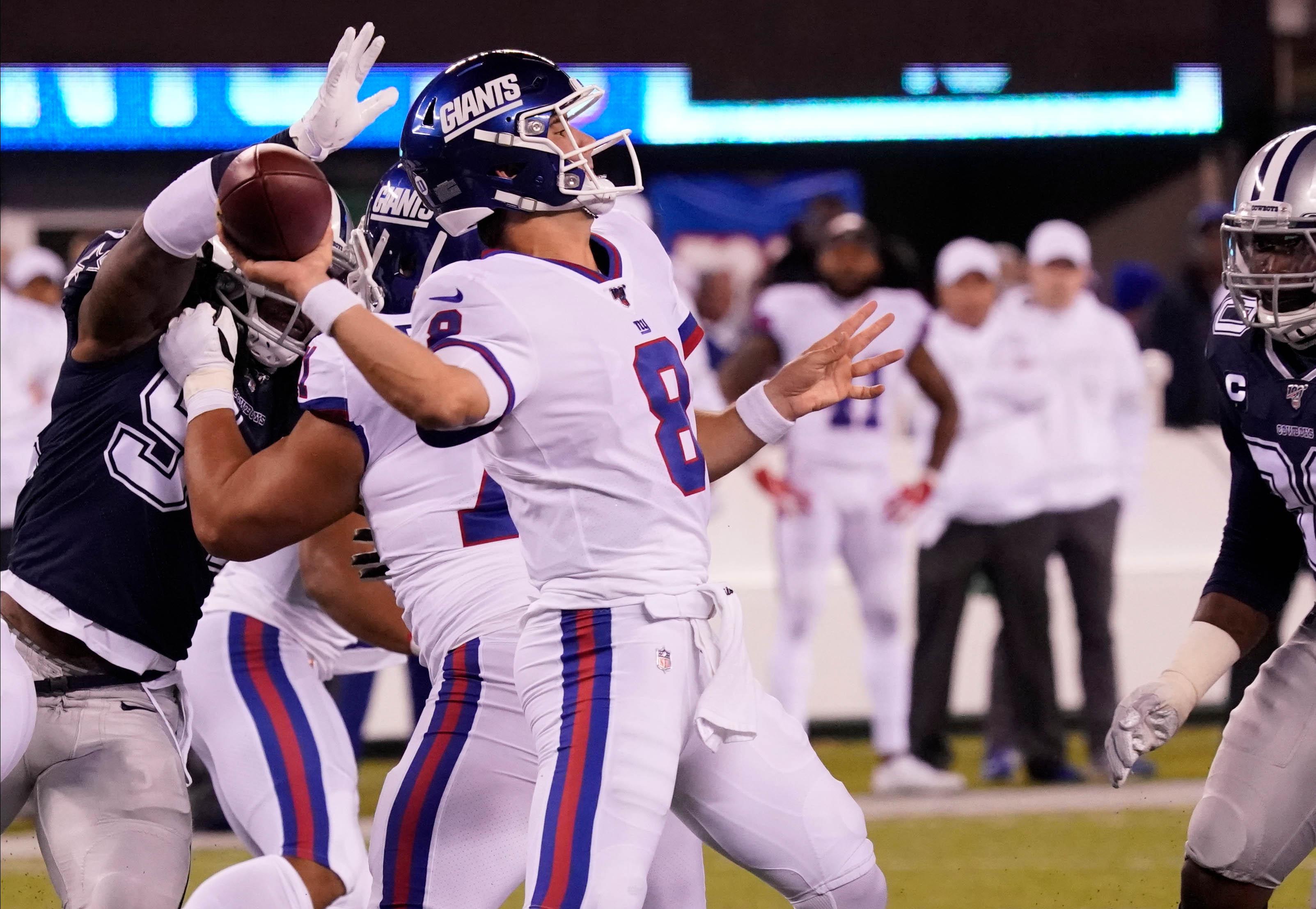 Nov 4, 2019; East Rutherford, NJ, USA; 
New York Giants quarterback Daniel Jones (8) throws in the 1st quarter against the Cowboys at MetLife Stadium. Mandatory Credit: Robert Deutsch-USA TODAY Sports