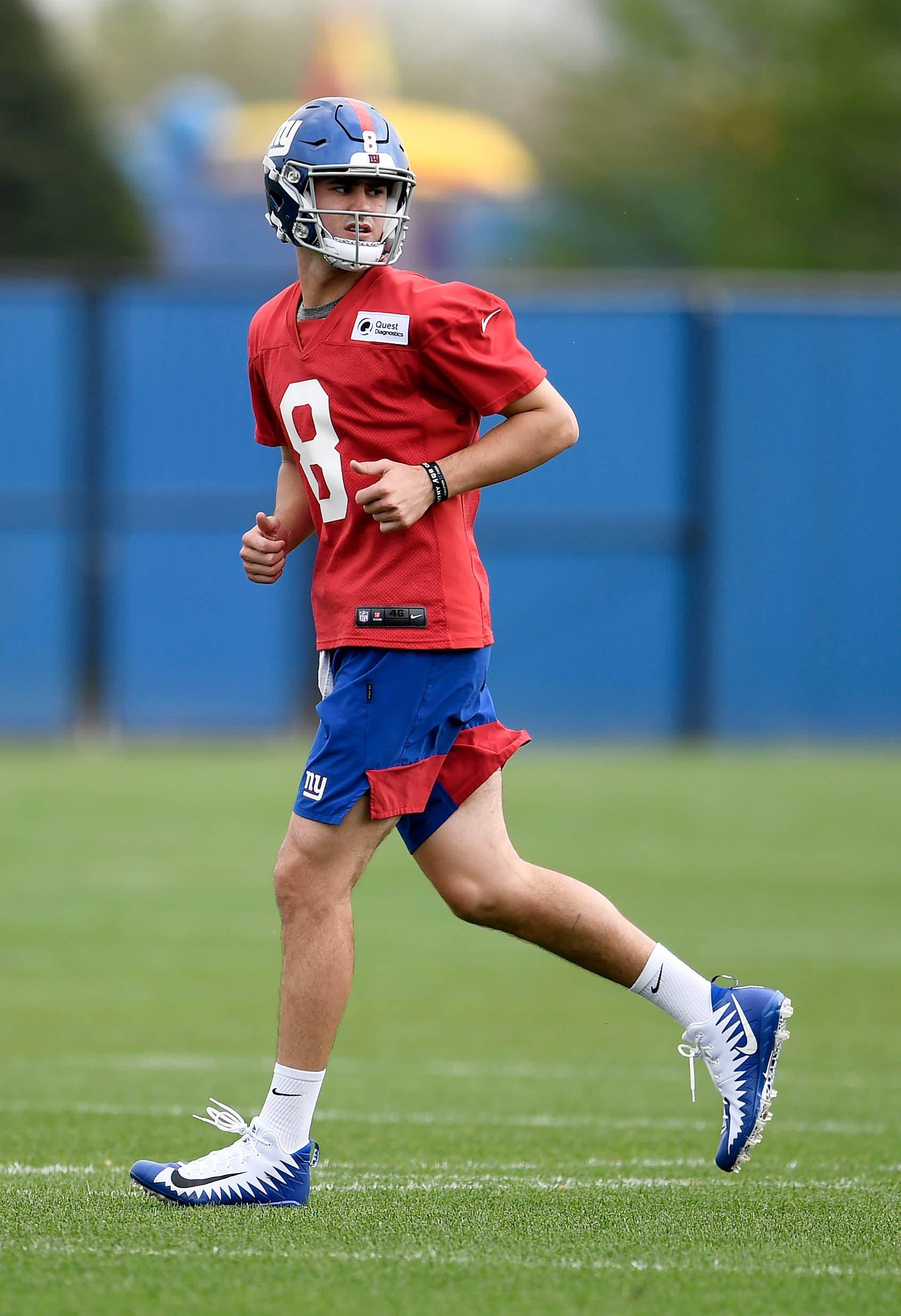 May 4, 2019; East Rutherford, NJ, USA; New York Giants quarterback Daniel Jones (8) runs between drills during rookie minicamp at Quest Diagnostics Training Center. Mandatory Credit: Sarah Stier-USA TODAY Sports / Sarah Stier