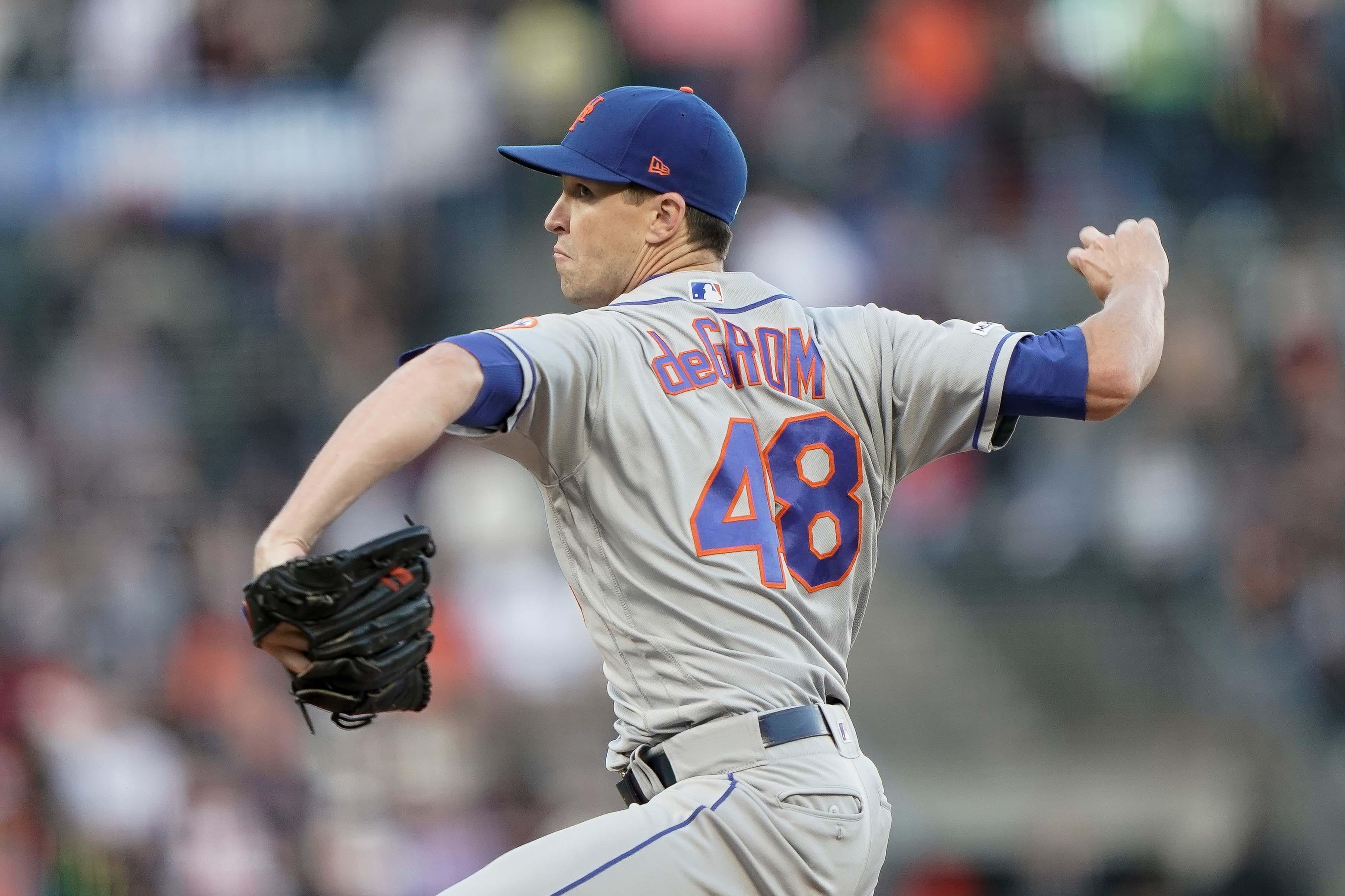 Jul 19, 2019; San Francisco, CA, USA; New York Mets starting pitcher Jacob deGrom (48) pitches against the San Francisco Giants during the first inning at Oracle Park. Mandatory Credit: Stan Szeto-USA TODAY Sports / Stan Szeto