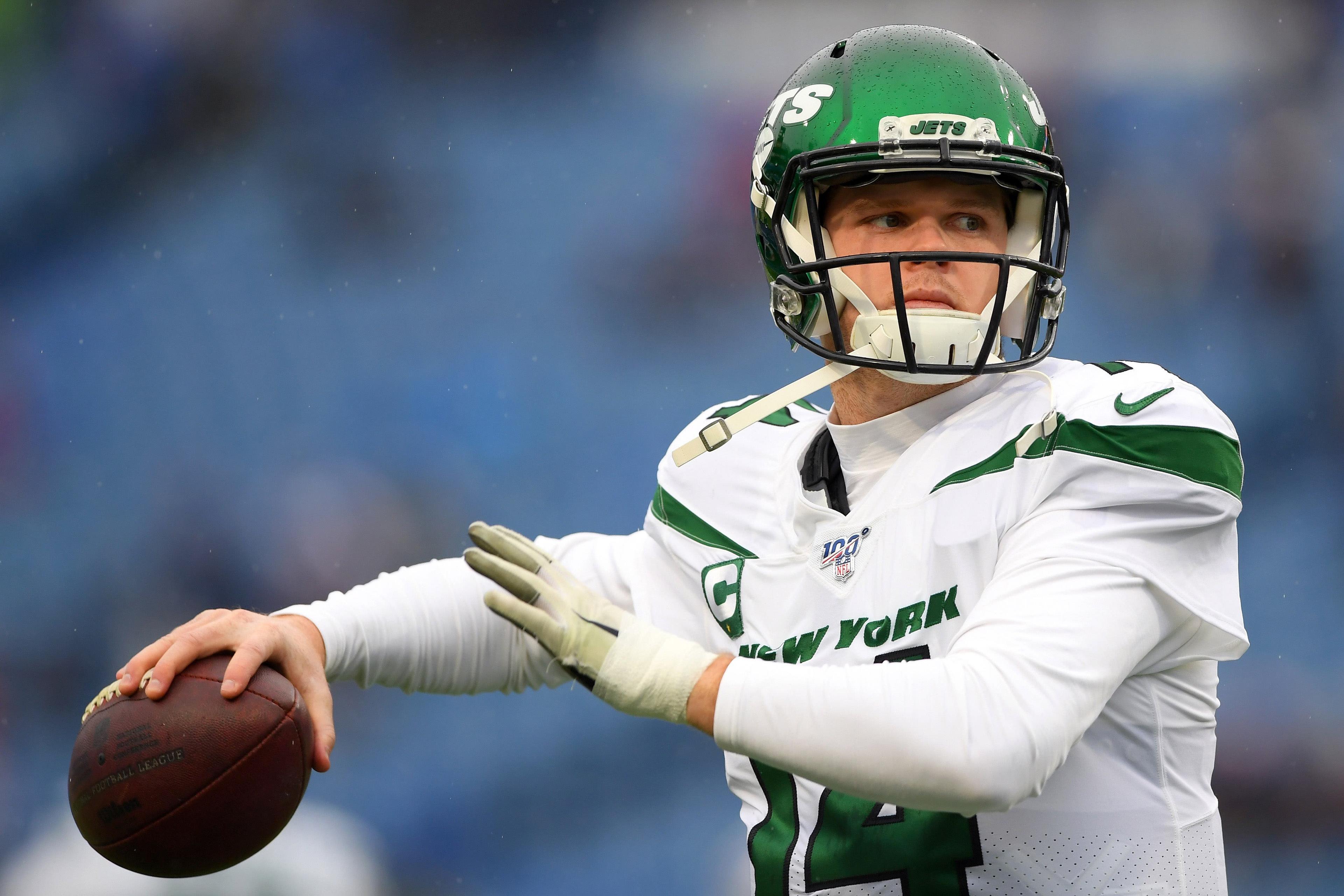 Dec 29, 2019; Orchard Park, New York, USA; New York Jets quarterback Sam Darnold (14) warms up prior to the game against the Buffalo Bills at New Era Field. Mandatory Credit: Rich Barnes-USA TODAY Sports / Rich Barnes