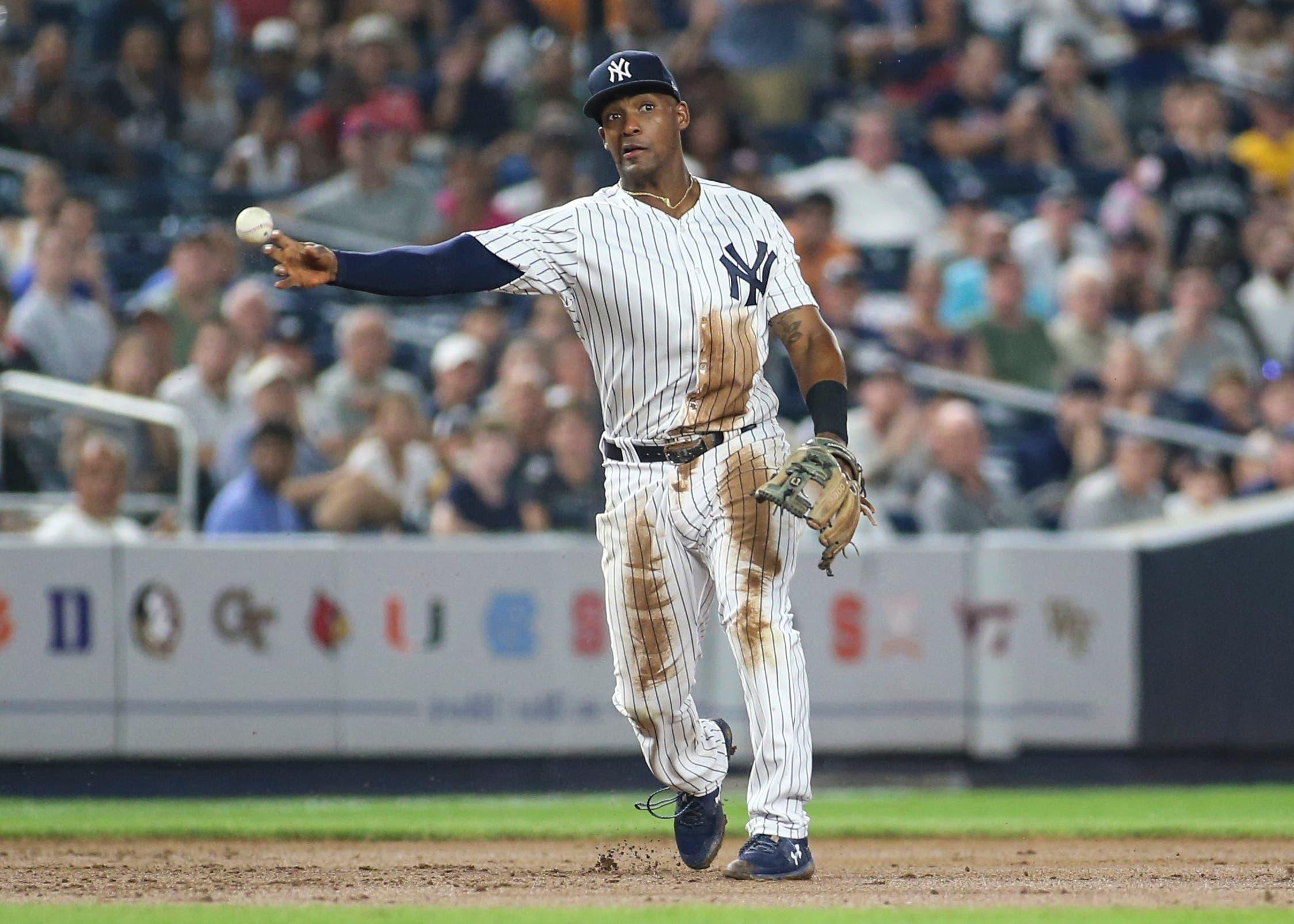 Aug 28, 2018; Bronx, NY, USA; New York Yankees third baseman Miguel Andujar (41) throws a runner out at first base to end the top of the fifth inning against the Chicago White Sox at Yankee Stadium. Mandatory Credit: Wendell Cruz-USA TODAY Sports / Wendell Cruz