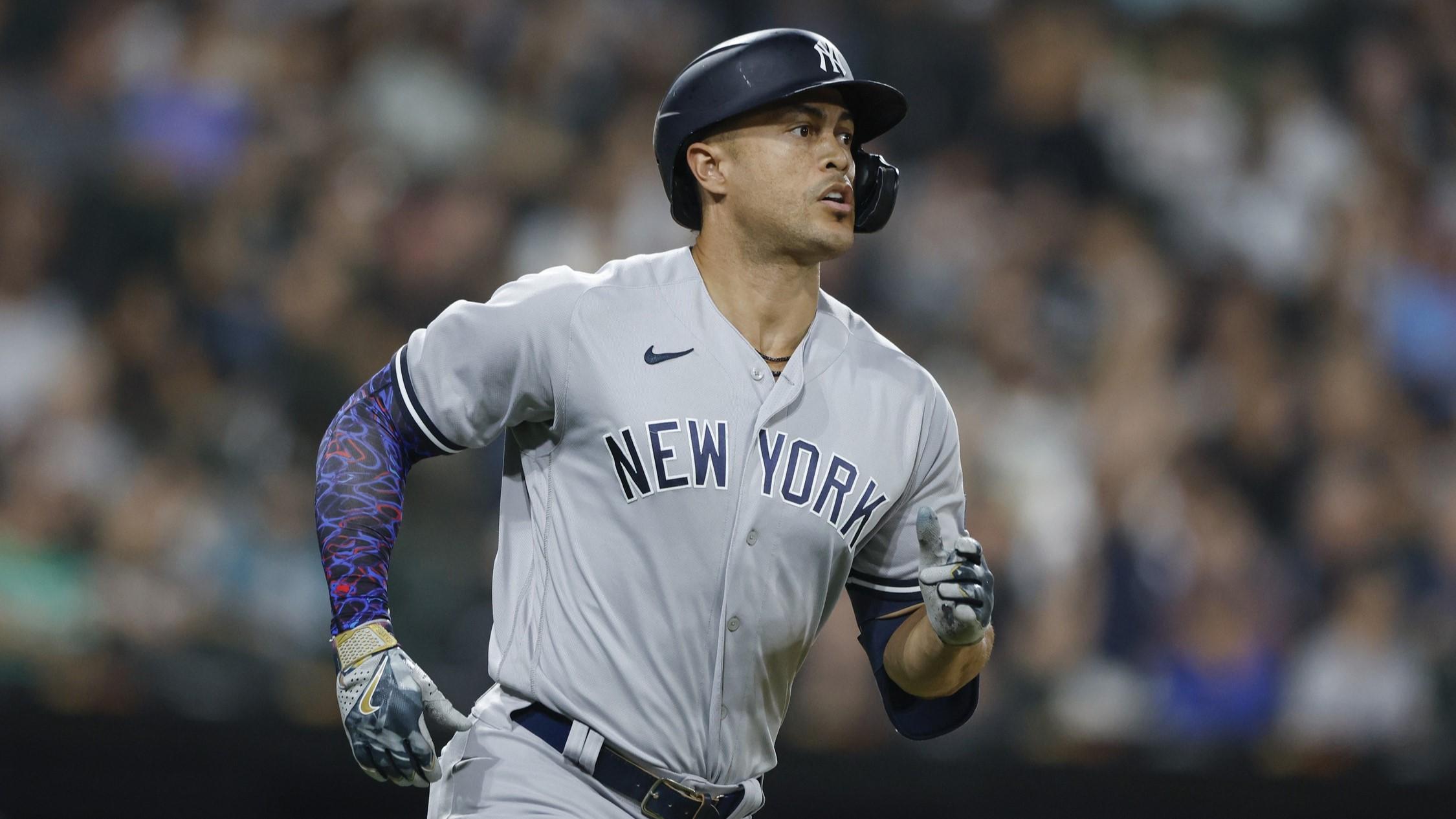Aug 9, 2023; Chicago, Illinois, USA; New York Yankees designated hitter Giancarlo Stanton (27) rounds the bases after hitting a solo home run against the Chicago White Sox during the seventh inning at Guaranteed Rate Field. / Kamil Krzaczynski-USA TODAY Sports
