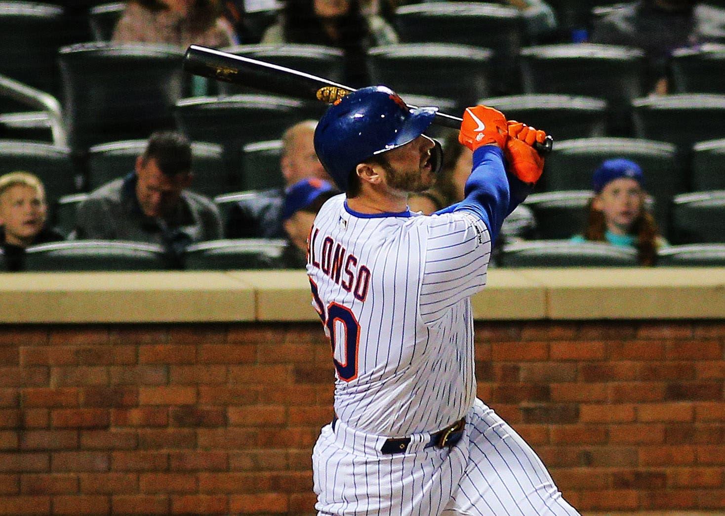 Apr 27, 2019; New York City, NY, USA; New York Mets first baseman Pete Alonso (20) hits a three run home run against the Milwaukee Brewers during the seventh inning at Citi Field. Mandatory Credit: Andy Marlin-USA TODAY Sports / Andy Marlin