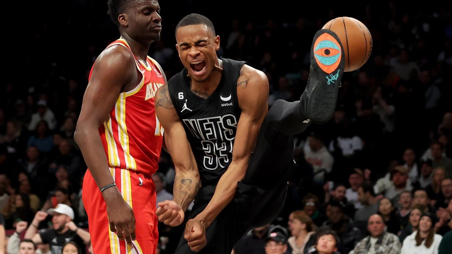 Mar 31, 2023; Brooklyn, New York, USA; Brooklyn Nets center Nic Claxton (33) reacts after dunking against Atlanta Hawks center Clint Capela (15) during the third quarter at Barclays Center. / Brad Penner-USA TODAY Sports
