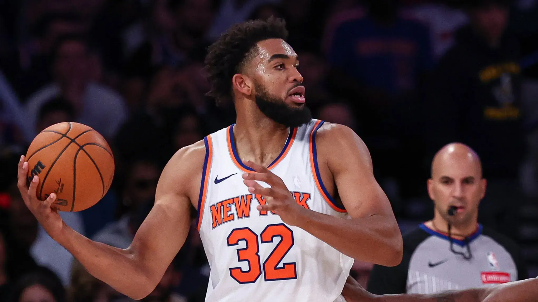 Oct 13, 2024; New York, New York, USA; New York Knicks center Karl-Anthony Towns (32) looks to pass as Minnesota Timberwolves guard Anthony Edwards (5) defends during the second half at Madison Square Garden. Mandatory Credit: Vincent Carchietta-Imagn Images / © Vincent Carchietta-Imagn Images