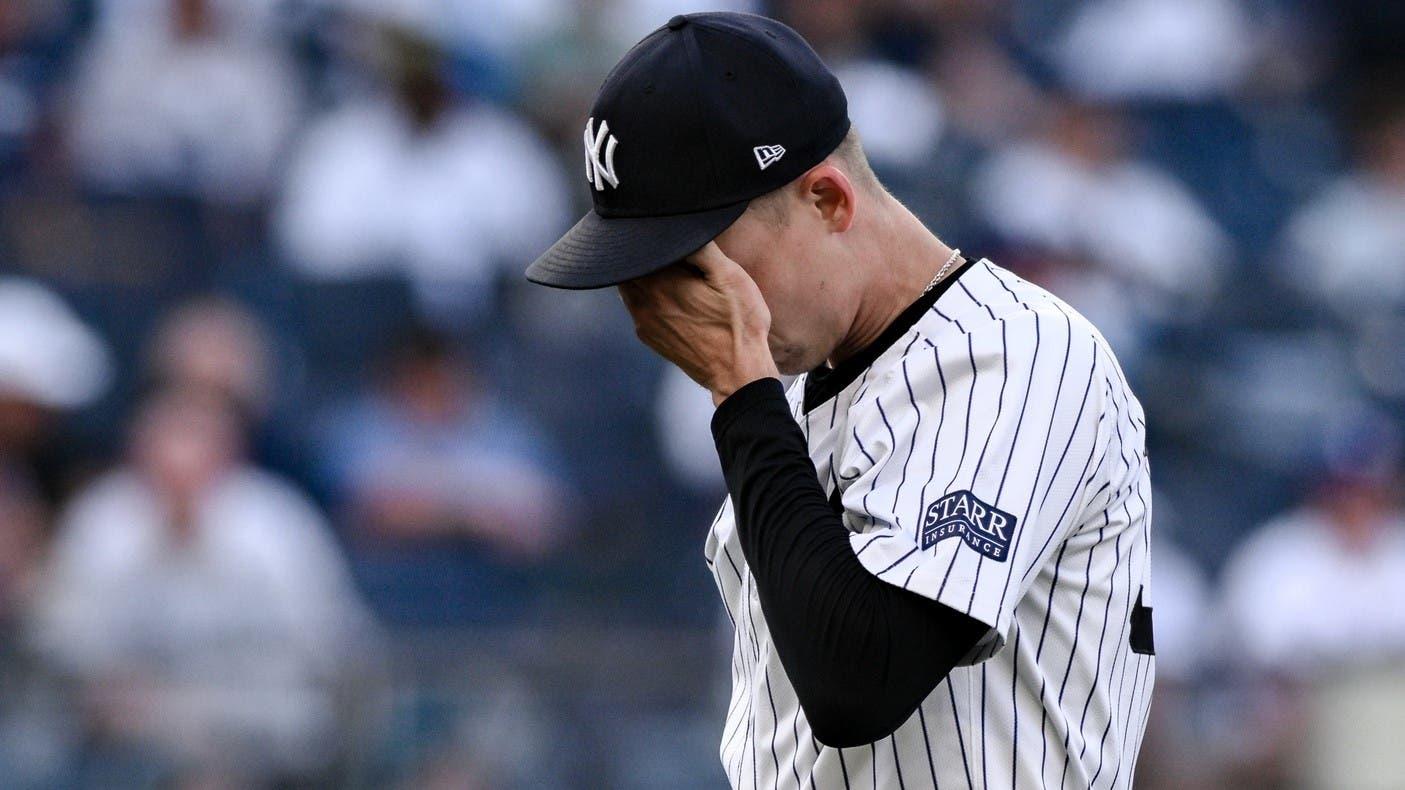 Aug 10, 2024; Bronx, New York, USA; New York Yankees pitcher Luke Weaver (30) reacts after leaving the game during the sixth inning against the Texas Rangers at Yankee Stadium. / John Jones-USA TODAY Sports