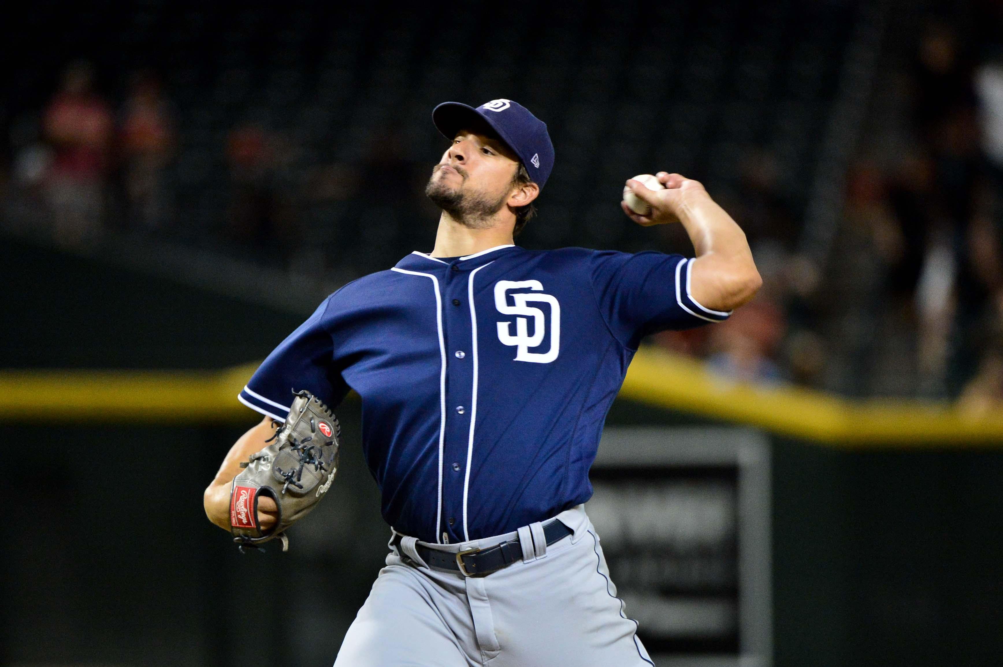 Jul 8, 2018; Phoenix, AZ, USA; San Diego Padres relief pitcher Brad Hand (52) throws during the sixteenth inning against the Arizona Diamondbacks at Chase Field. Mandatory Credit: Matt Kartozian-USA TODAY Sports / Matt Kartozian