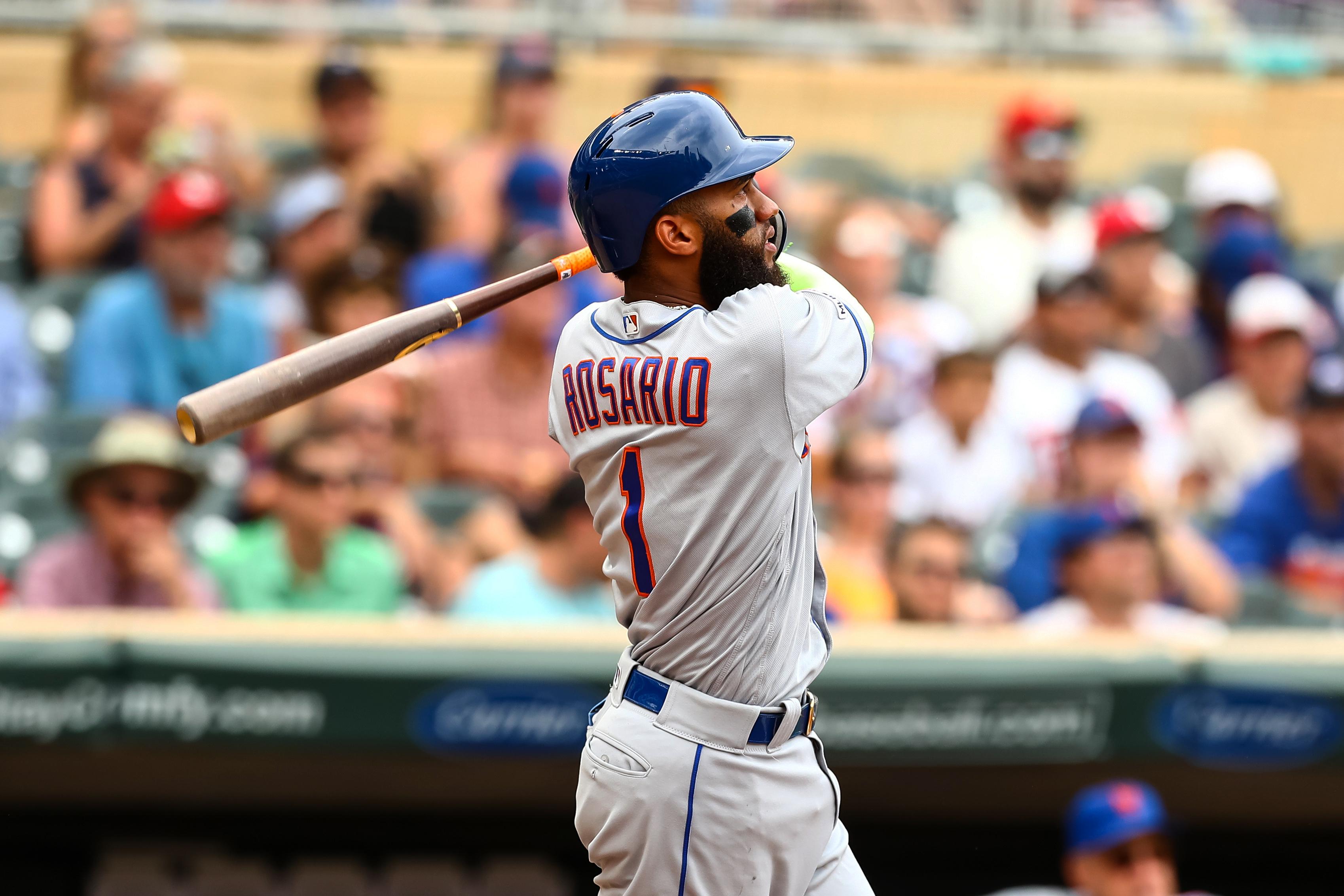 Jul 17, 2019; Minneapolis, MN, USA; New York Mets shortstop Amed Rosario (1) hits a solo home run against the Minnesota Twins in the third inning at Target Field. Mandatory Credit: David Berding-USA TODAY Sports