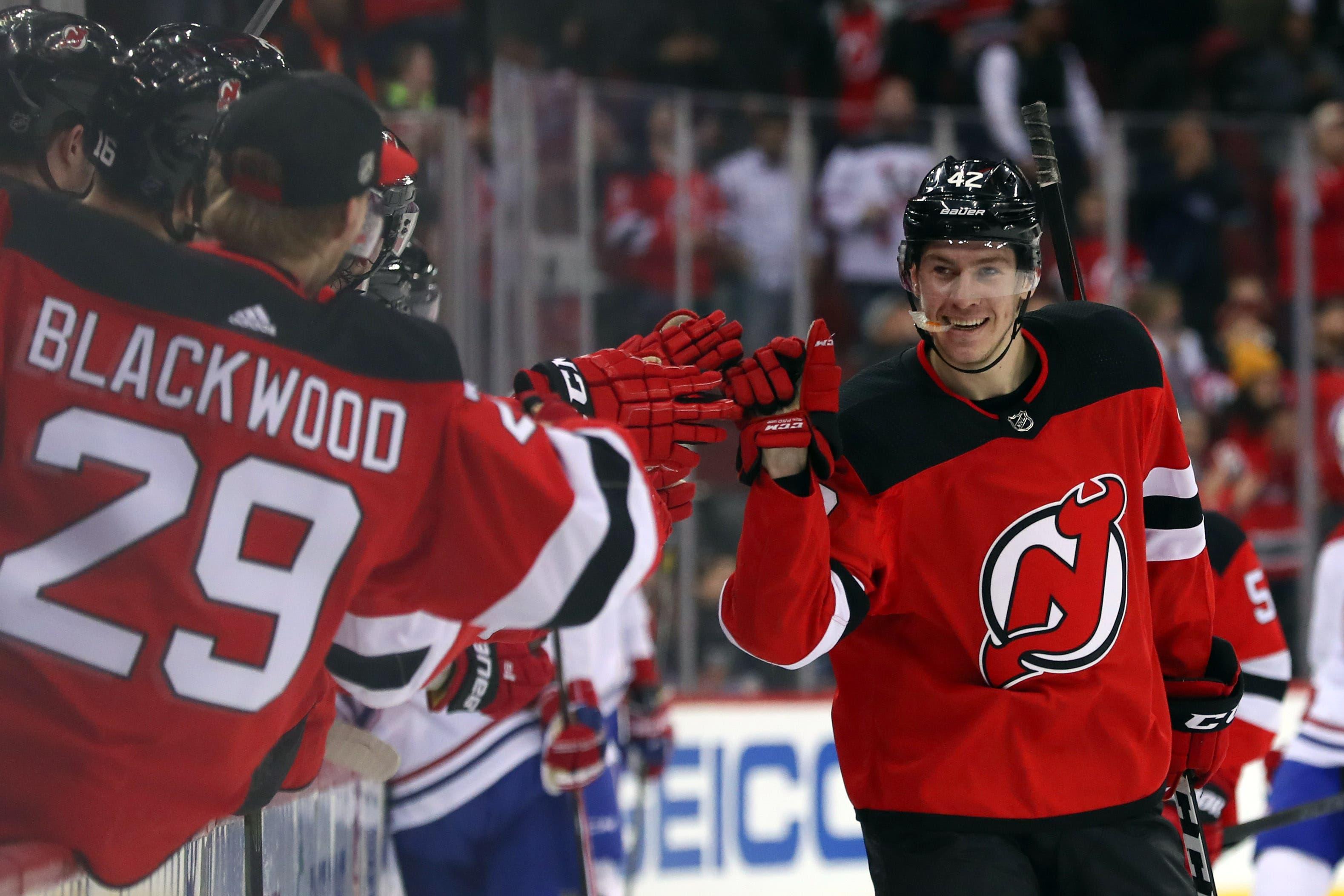 New Jersey Devils right wing Nathan Bastian celebrates his first NHL goal during the first period of their game against the Montreal Canadiens at Prudential Center. / Ed Mulholland/USA TODAY Sports