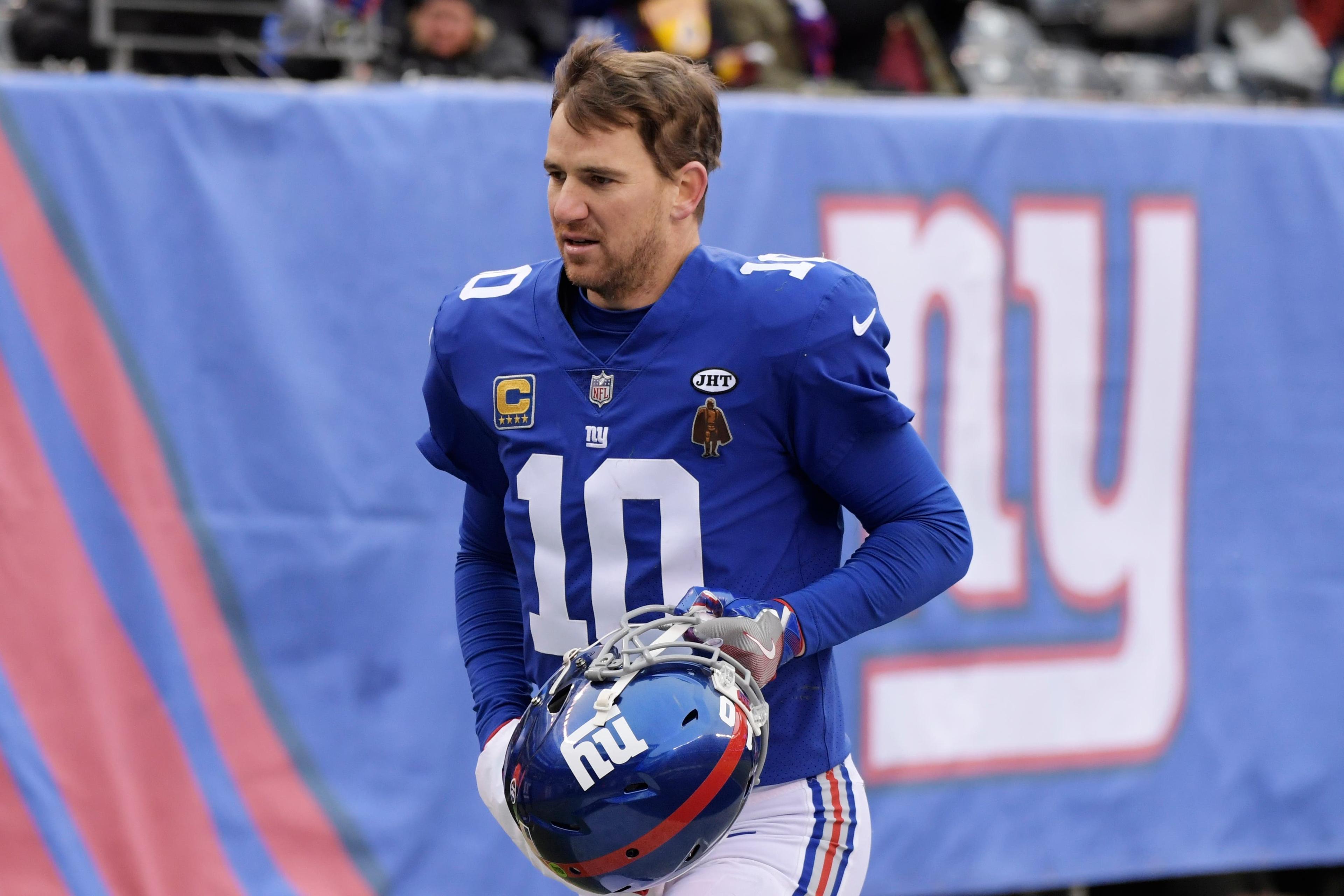 New York Giants quarterback Eli Manning (10) runs off the field during the halftime break of an NFL football game against the Washington Redskins Sunday, Dec. 31, 2017, in East Rutherford, N.J. (AP Photo/Bill Kostroun) / Bill Kostroun/AP