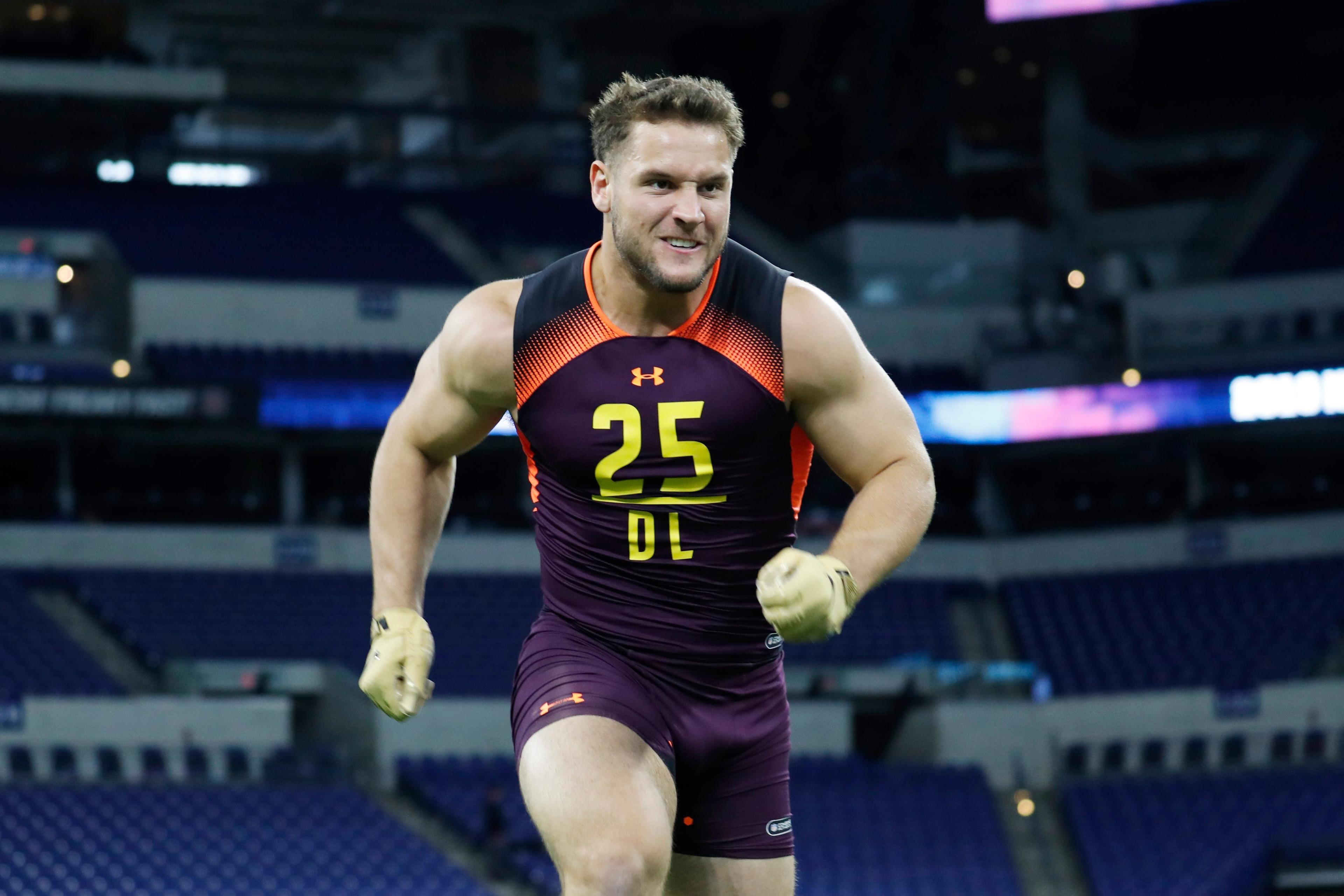 Mar 3, 2019; Indianapolis, IN, USA; Ohio State defensive lineman Nick Bosa (DL25) goes through workout drills during the 2019 NFL Combine at Lucas Oil Stadium. Mandatory Credit: Brian Spurlock-USA TODAY Sports / Brian Spurlock