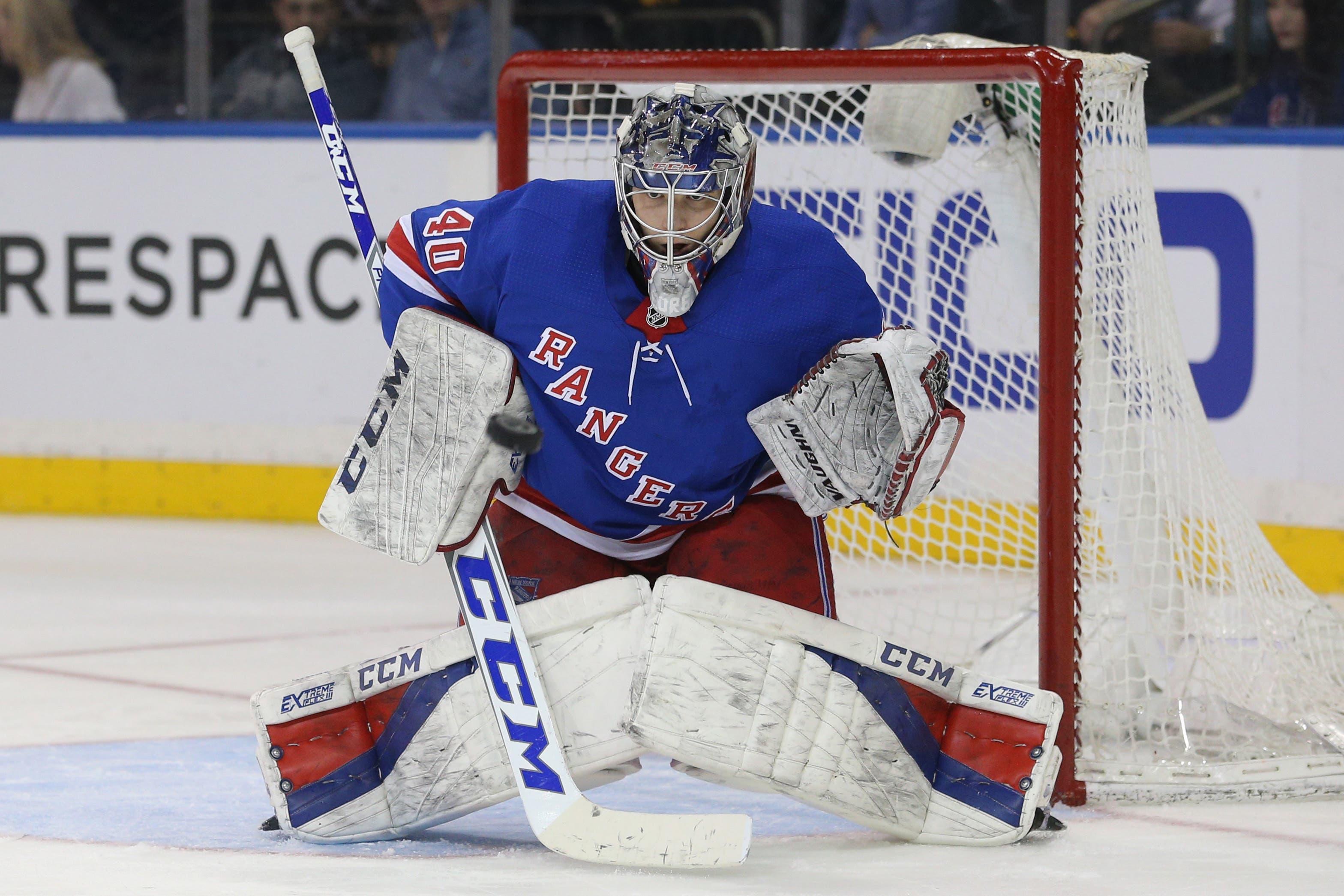 Mar 14, 2018; New York, NY, USA; New York Rangers goalie Alexandar Georgiev (40) makes a save against the Pittsburgh Penguins during the third period at Madison Square Garden. Mandatory Credit: Brad Penner-USA TODAY Sports / Brad Penner