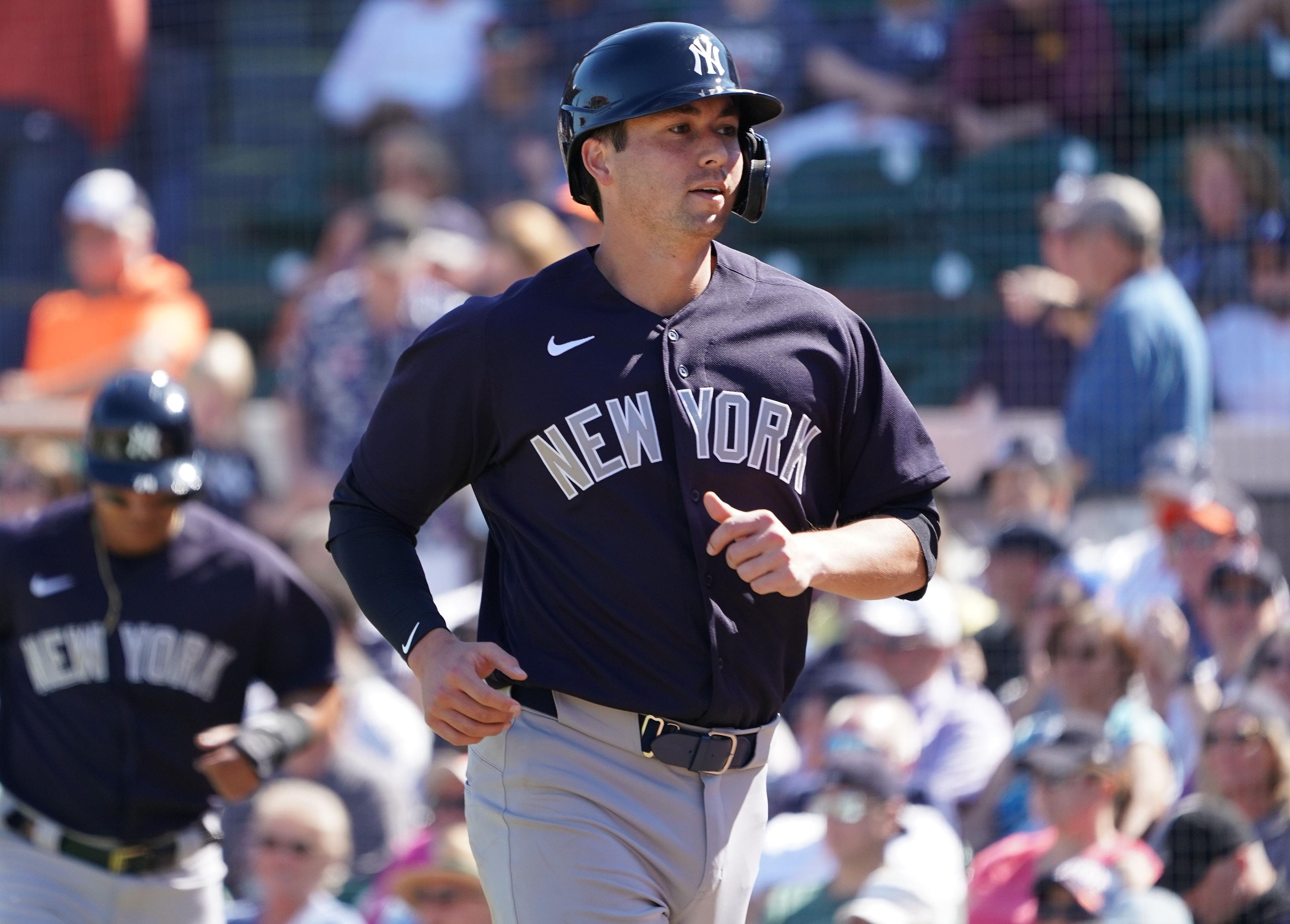 Mar 1, 2020; Lakeland, Florida, USA; New York Yankees catcher Kyle Higashioka (66) heads to the dugout after scoring a run against the Detroit Tigers during the fifth inning at Publix Field at Joker Marchant Stadium. Mandatory Credit: John David Mercer-USA TODAY Sports / John David Mercer