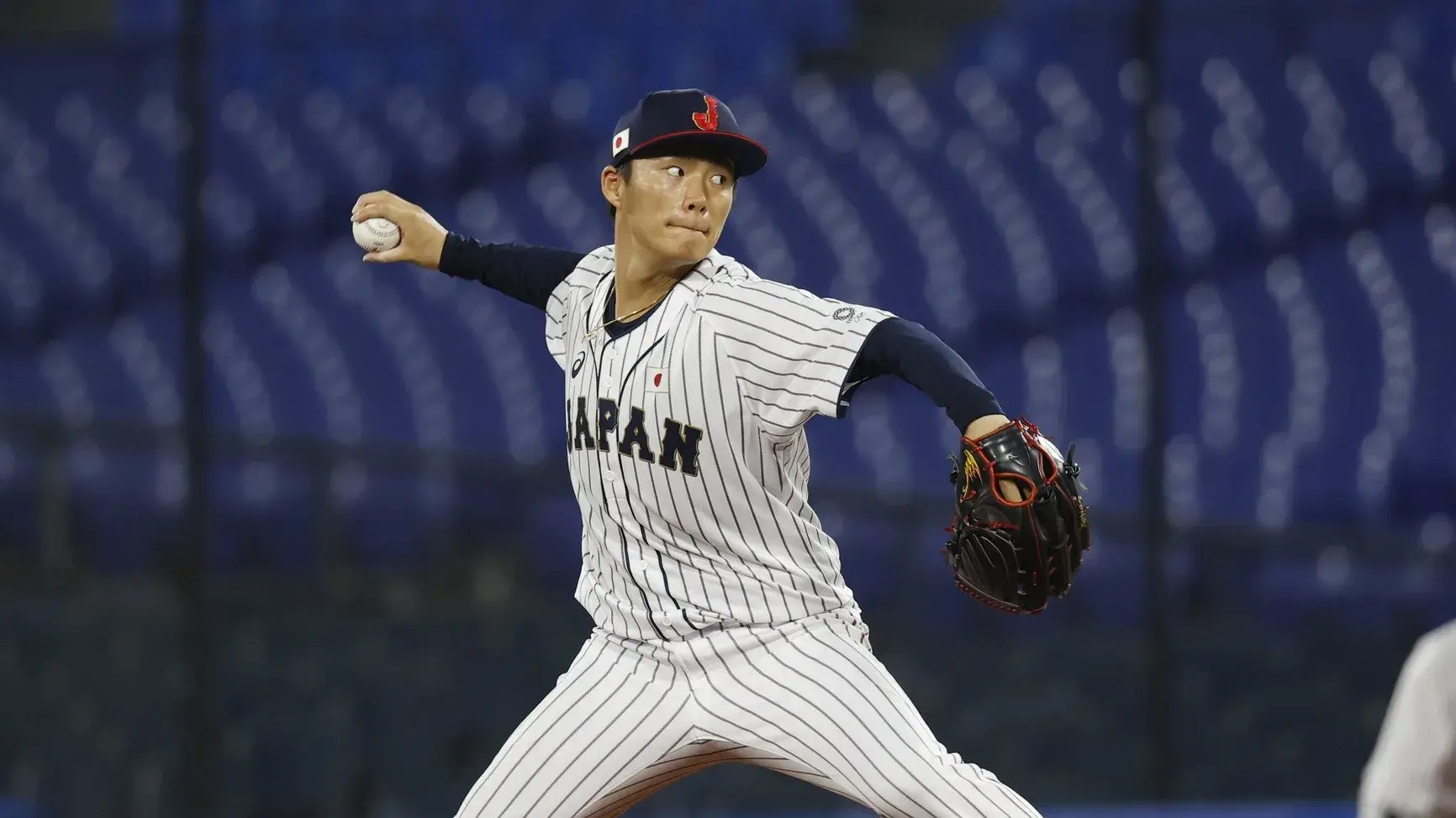 Team Japan pitcher Yoshinobu Yamamoto (17) throws a pitch against Korea in a baseball semifinal match during the Tokyo 2020 Olympic Summer Games at Yokohama Baseball Stadium. / Yukihito Taguchi-USA TODAY Sports