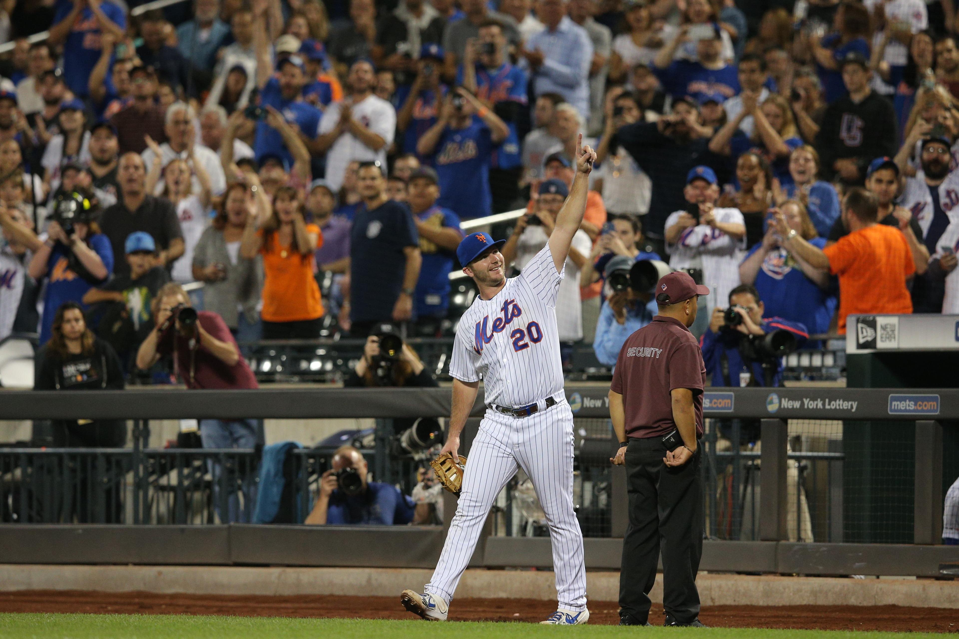 Sep 28, 2019; New York City, NY, USA; New York Mets first baseman Pete Alonso (20) celebrates his third inning solo home run against the Atlanta Braves as he comes onto the field for the fourth inning at Citi Field. The home run was his 53rd of the season breaking the rookie record for home runs in a single season. Mandatory Credit: Brad Penner-USA TODAY Sportsundefined