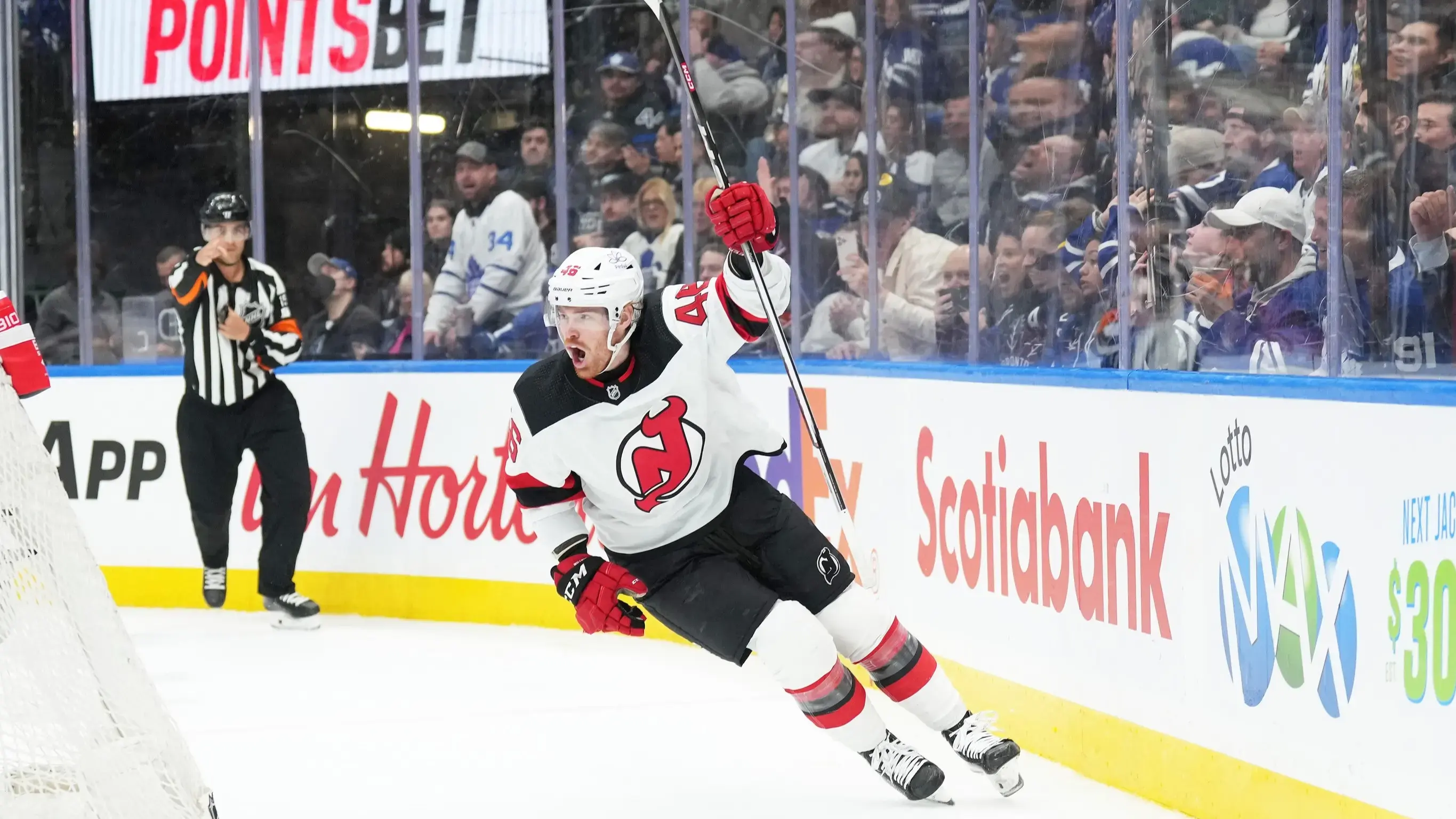 Mar 26, 2024; Toronto, Ontario, CAN; New Jersey Devils center Max Willman (46) celebrates scoring a goal against the Toronto Maple Leafs during the second period at Scotiabank Arena. / Nick Turchiaro-USA TODAY Sports