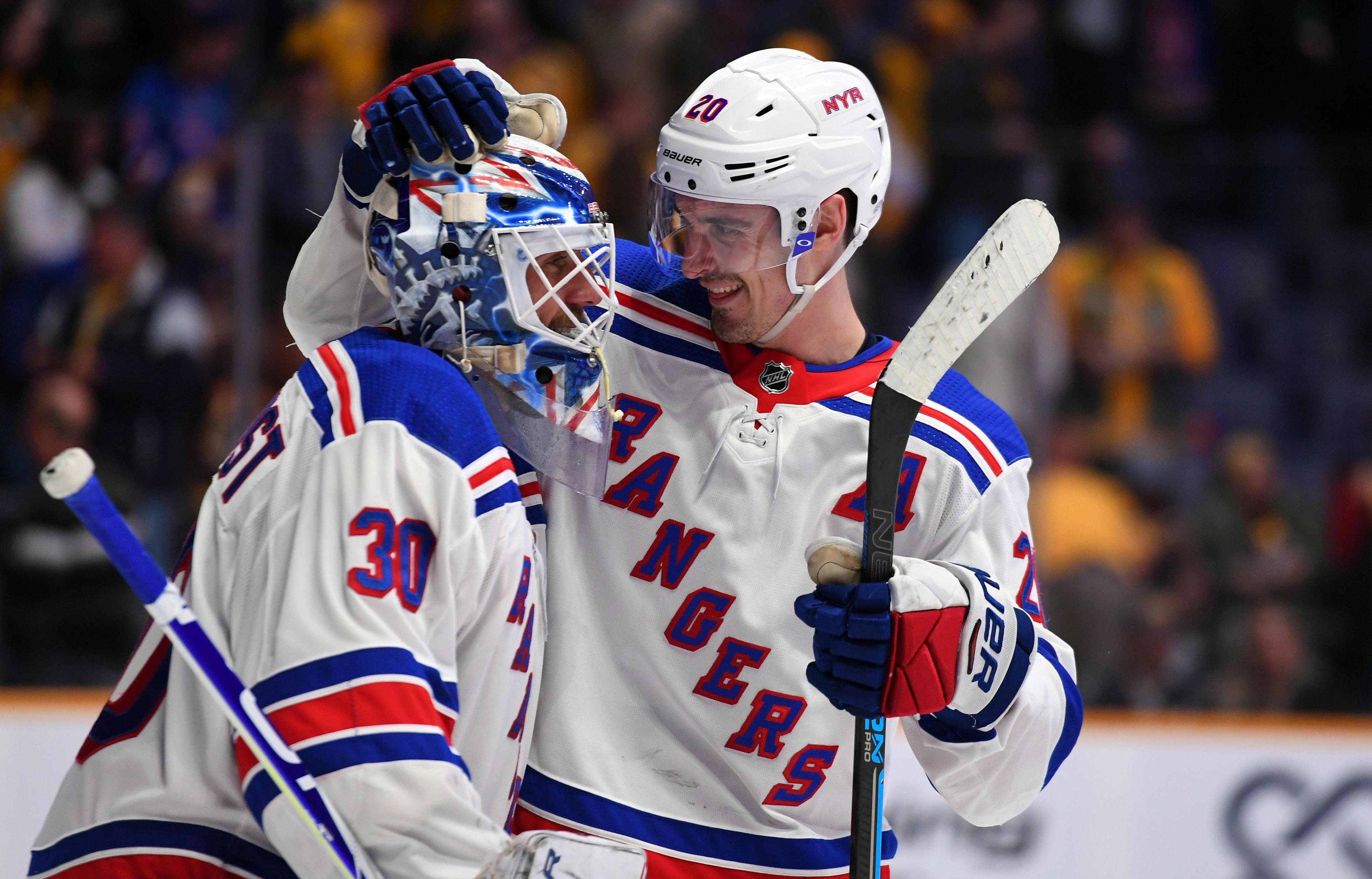 Dec 29, 2018; Nashville, TN, USA; New York Rangers goaltender Henrik Lundqvist (30) celebrates with New York Rangers left wing Chris Kreider (20) after a win against the Nashville Predators at Bridgestone Arena. Mandatory Credit: Christopher Hanewinckel-USA TODAY Sports / Christopher Hanewinckel