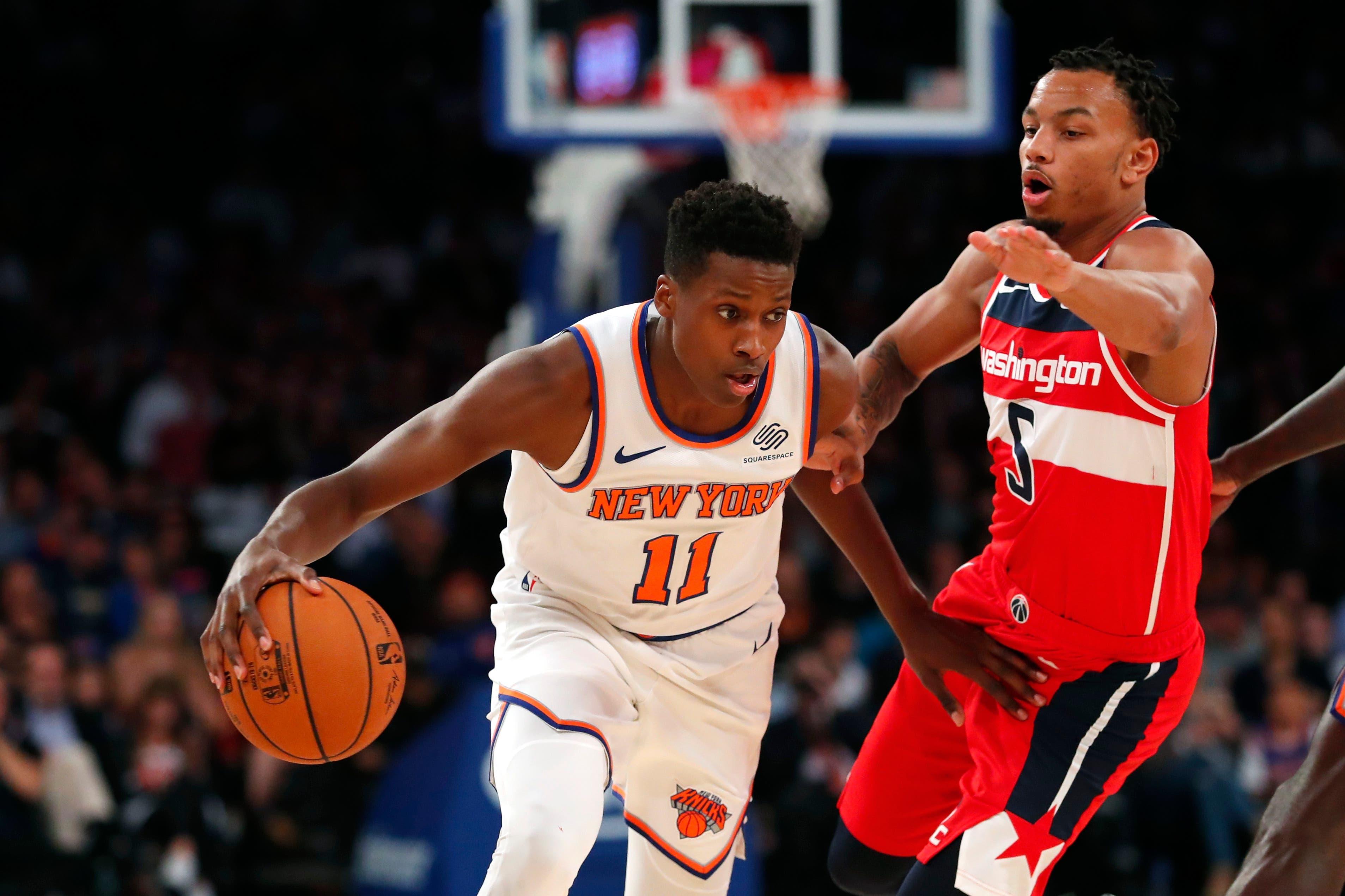 Oct 11, 2019; New York, NY, USA; New York Knicks guard Frank Ntilikina (11) drives to the basket against Washington Wizards guard Justin Robinson (5) during the second half at Madison Square Garden. Mandatory Credit: Noah K. Murray-USA TODAY Sports / Noah K. Murray