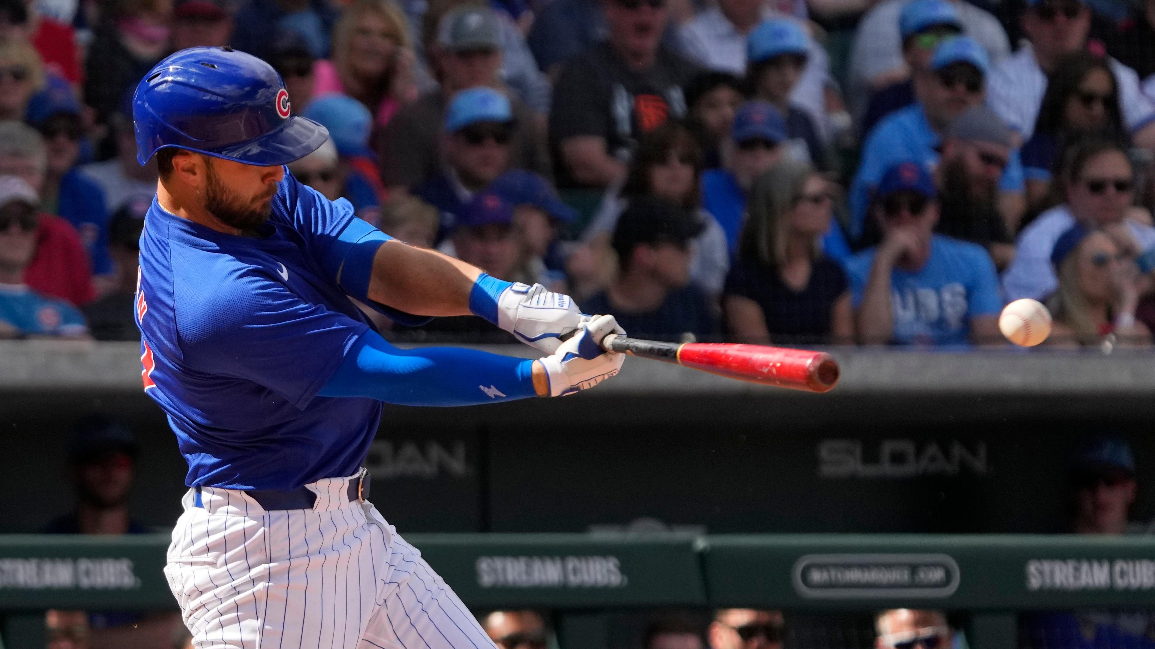 Chicago Cubs Joe Hudson (57) hits a single against the Cleveland Guardians in the third inning at Sloan Park. / Rick Scuteri-USA TODAY Sports