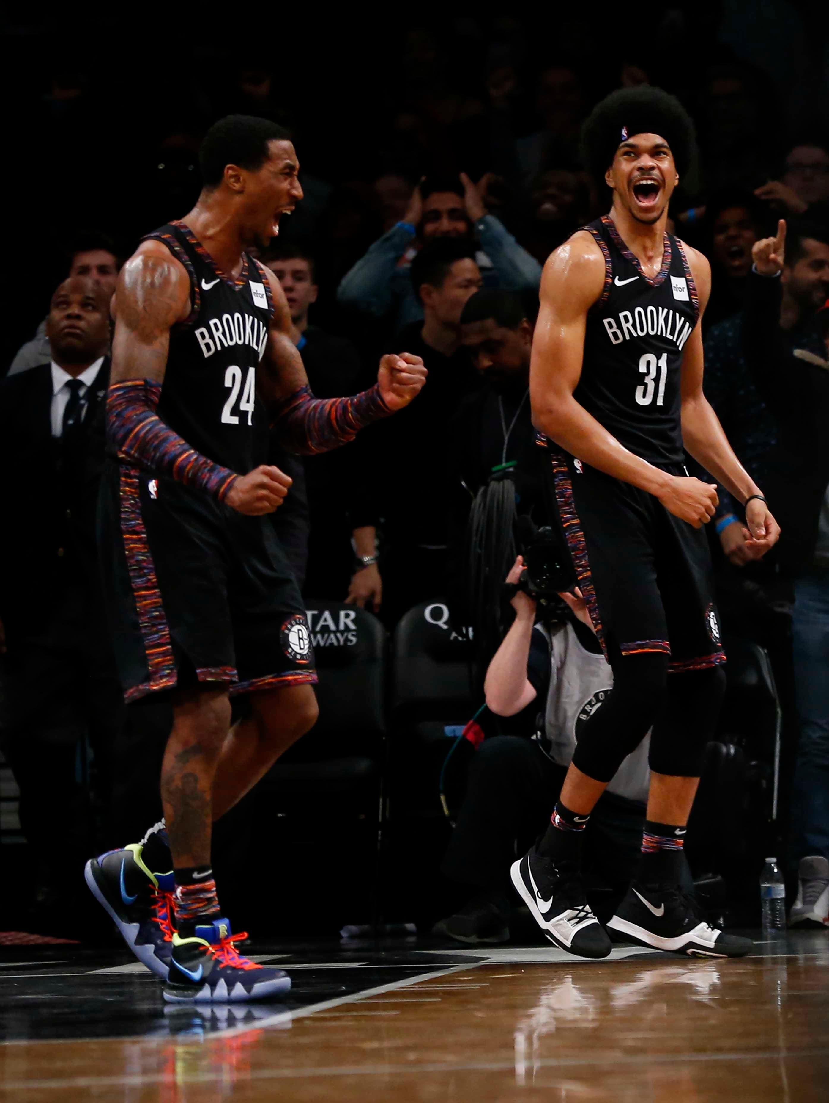 Dec 7, 2018; Brooklyn, NY, USA; Brooklyn Nets forward Rondae Hollis-Jefferson (24) and Brooklyn Nets center Jarrett Allen (31) celebrate after defeating the Toronto Raptors 106-105 in overtime at Barclays Center. 
Mandatory Credit: Noah K. Murray-USA TODAY Sports / Noah K. Murray