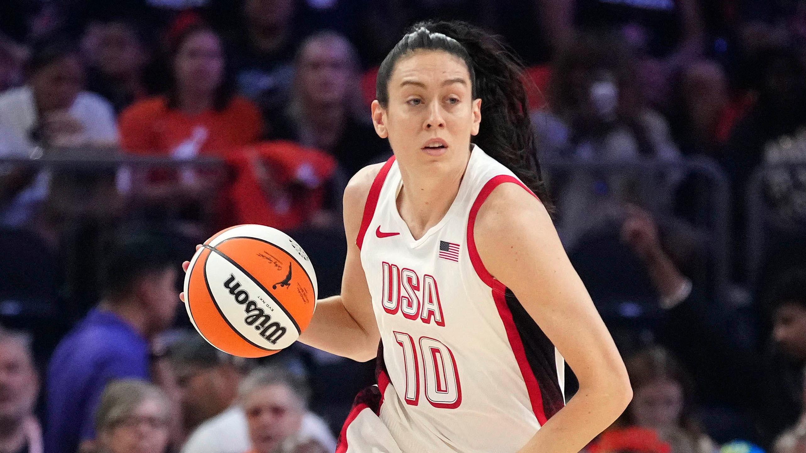 Team USA forward Breanna Stewart (10) dribbles up the court against the WNBA Team during the WNBA All-Star Game in Phoenix on July 20, 2024.