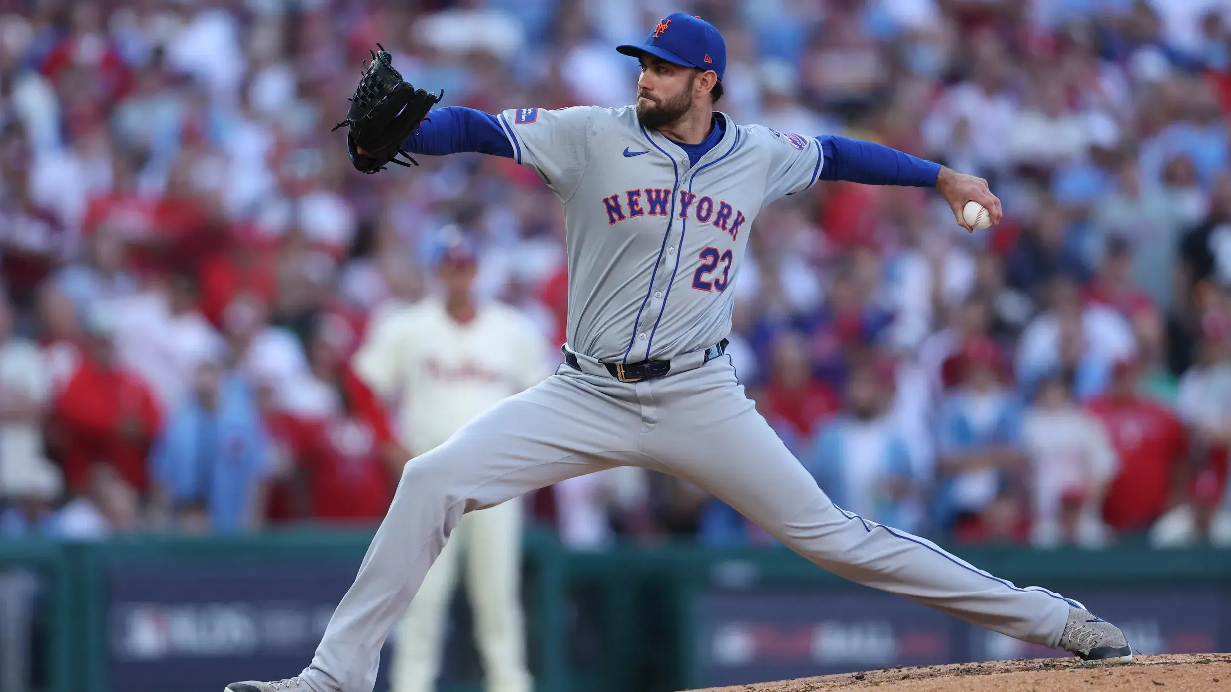 Oct 5, 2024; Philadelphia, PA, USA; New York Mets pitcher David Peterson (23) throws a pitch against the Philadelphia Phillies in the third inning in game one of the NLDS for the 2024 MLB Playoffs at Citizens Bank Park. / Bill Streicher-Imagn Images