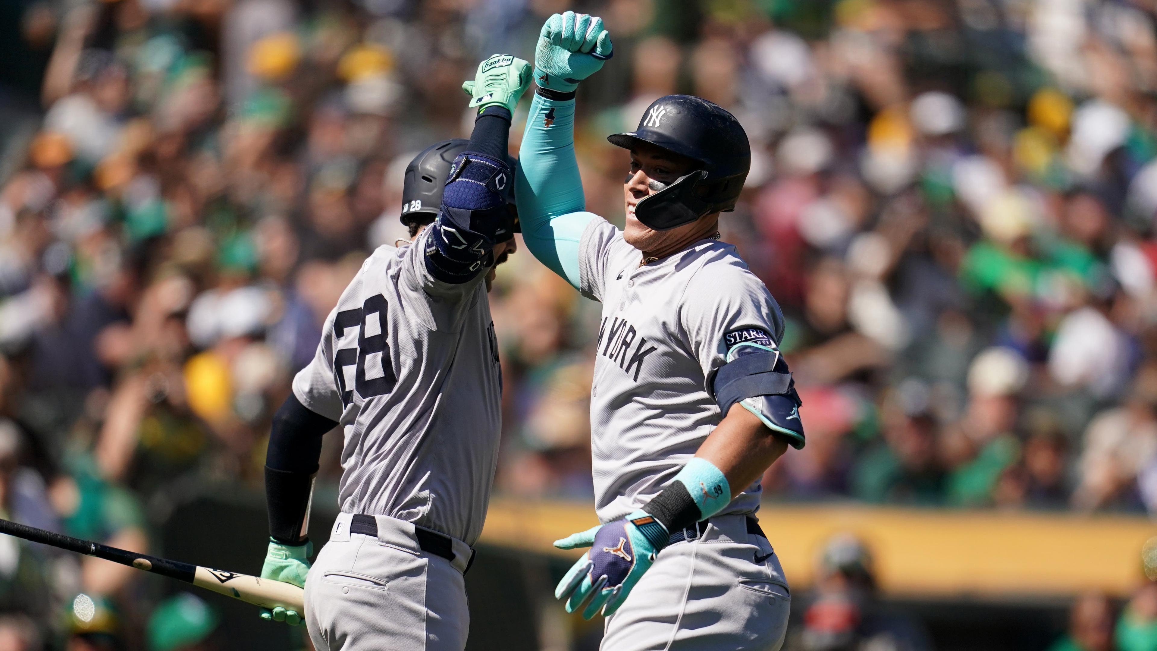 Yankees launch three homers, complete sweep of Athletics