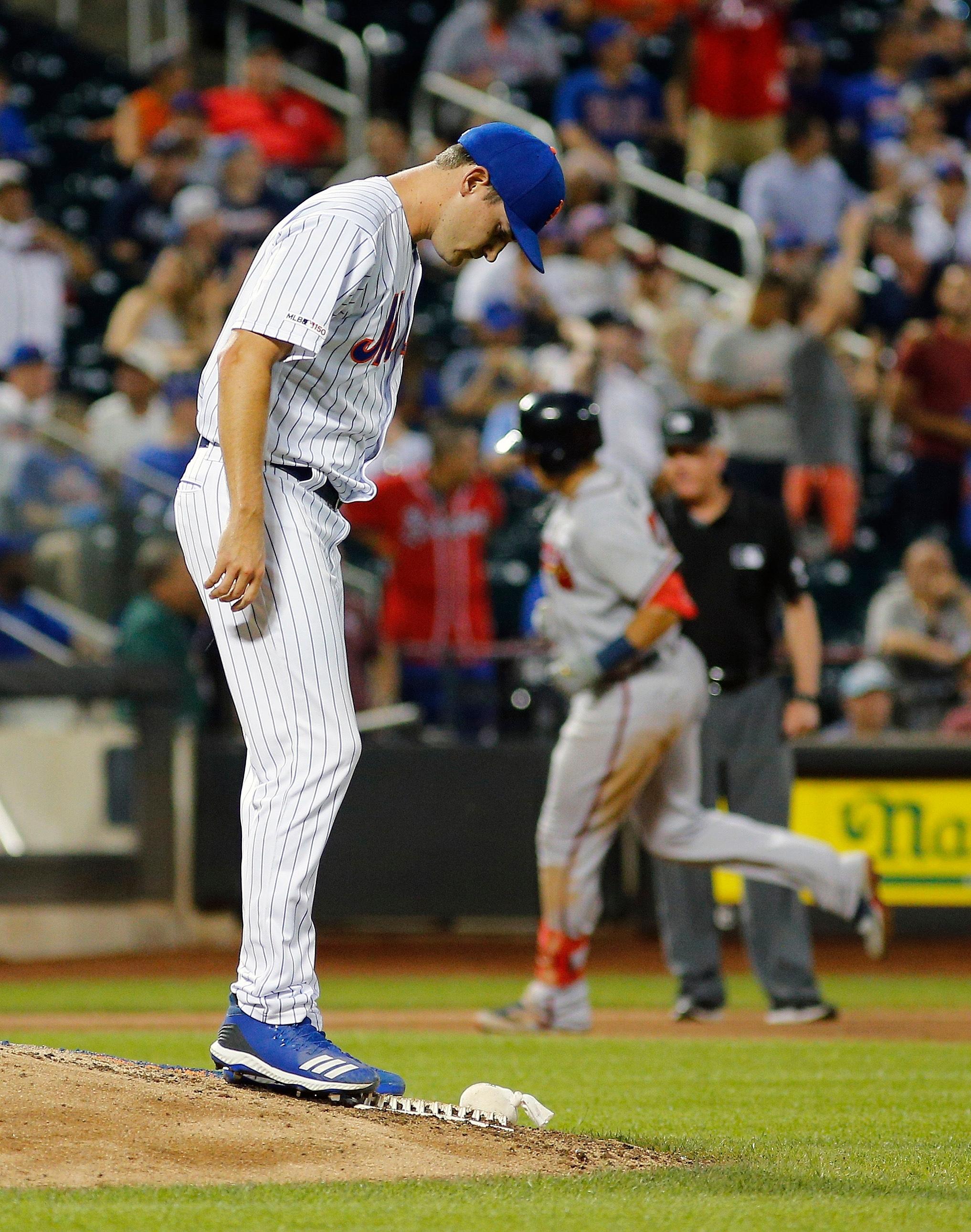 Jun 29, 2019; New York City, NY, USA; Atlanta Braves left fielder Austin Riley (right) rounds the bases after hitting a solo home run as New York Mets pitcher Seth Lugo (67) looks away during the eighth inning at Citi Field. Mandatory Credit: Andy Marlin-USA TODAY Sports 