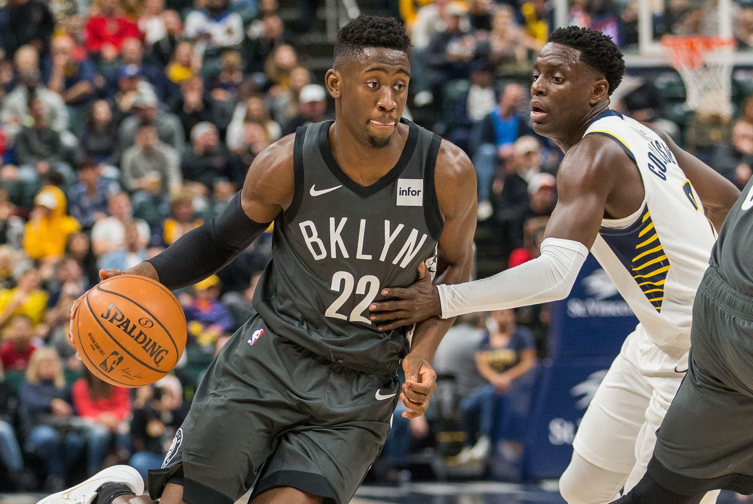 Oct 20, 2018; Indianapolis, IN, USA; Brooklyn Nets guard Caris LeVert (22) dribbles the ball while Indiana Pacers guard Darren Collison (2) defends in the second half at Bankers Life Fieldhouse. Mandatory Credit: Trevor Ruszkowski-USA TODAY Sports / Trevor Ruszkowski