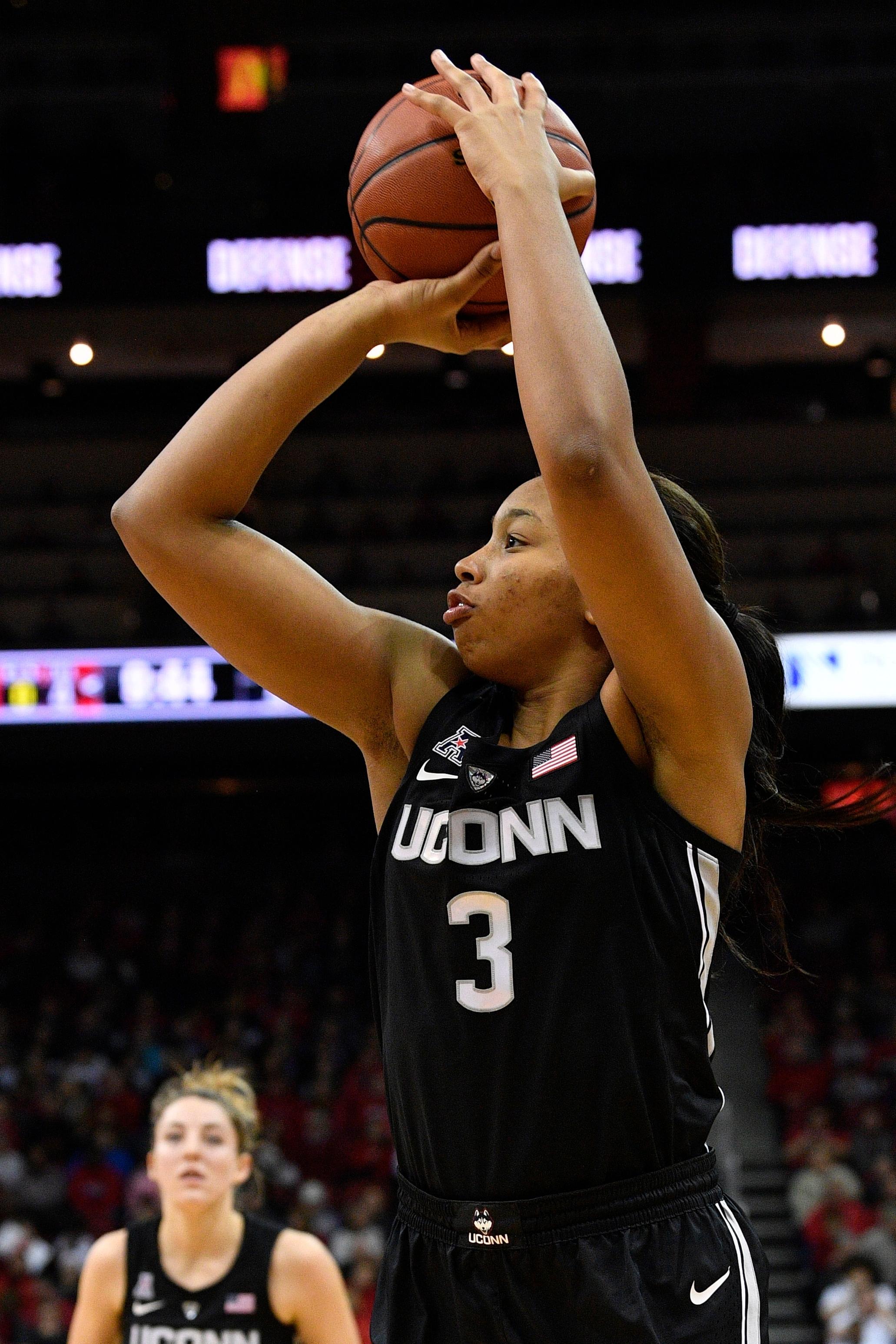 Jan 31, 2019; Louisville, KY, USA; Connecticut Huskies guard/forward Megan Walker (3) shoots against the Louisville Cardinals during the first half at KFC Yum! Center. Mandatory Credit: Jamie Rhodes-USA TODAY Sports