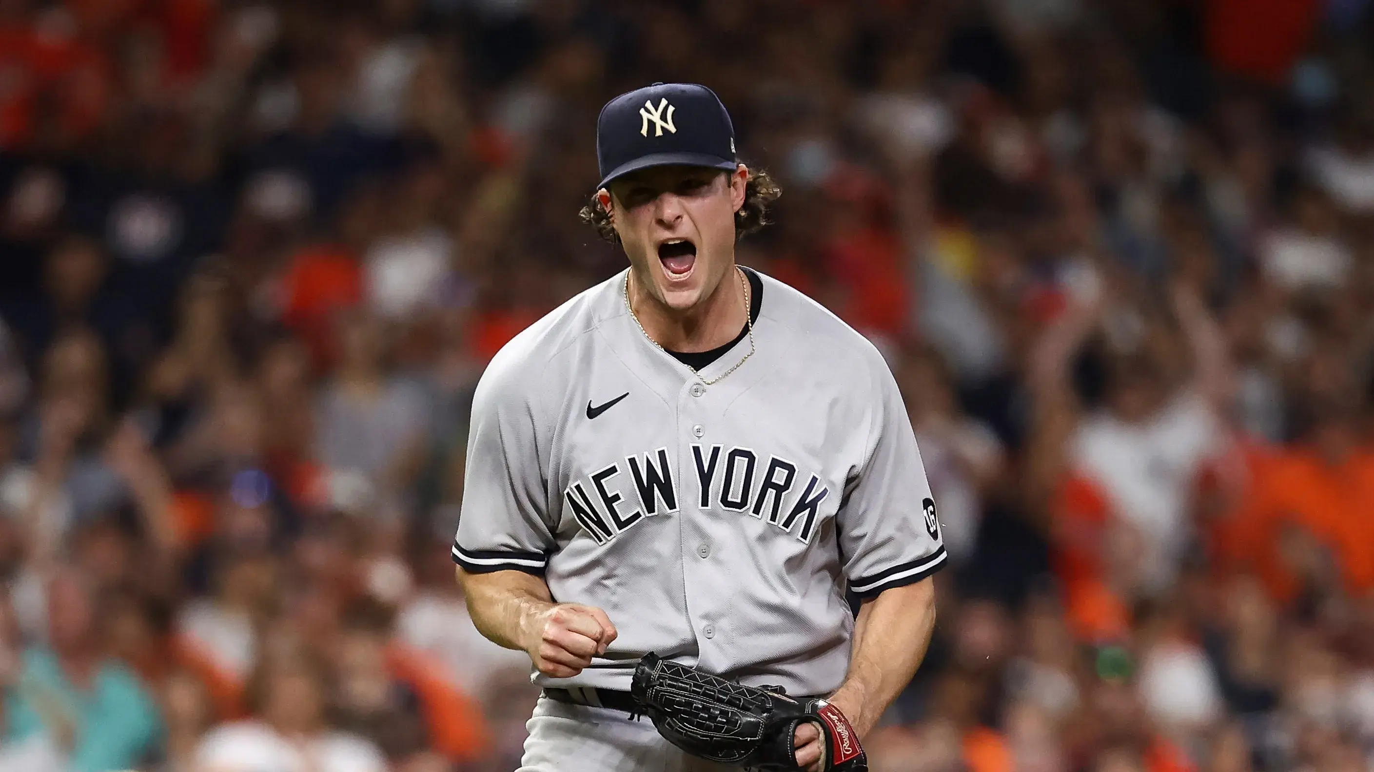 Jul 10, 2021; Houston, Texas, USA; New York Yankees starting pitcher Gerrit Cole (45) reacts after recording a strikeout against the Houston Astros to end the game at Minute Maid Park. Mandatory Credit: Troy Taormina-USA TODAY Sports / Troy Taormina-USA TODAY Sports