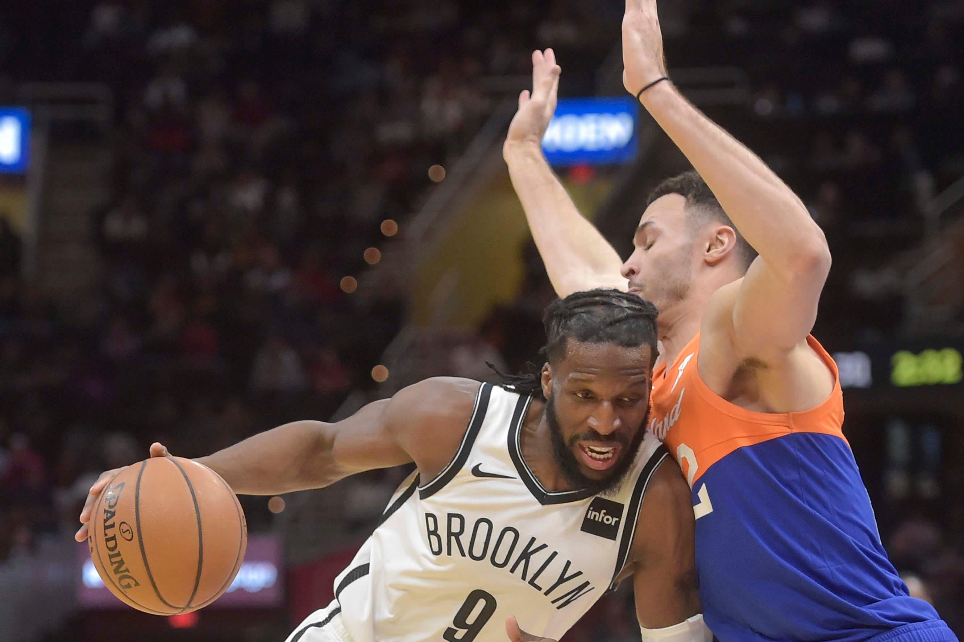 Feb 13, 2019; Cleveland, OH, USA; Brooklyn Nets forward DeMarre Carroll (9) drives against Cleveland Cavaliers forward Larry Nance Jr. (22) in the third quarter at Quicken Loans Arena. Mandatory Credit: David Richard-USA TODAY Sports / David Richard