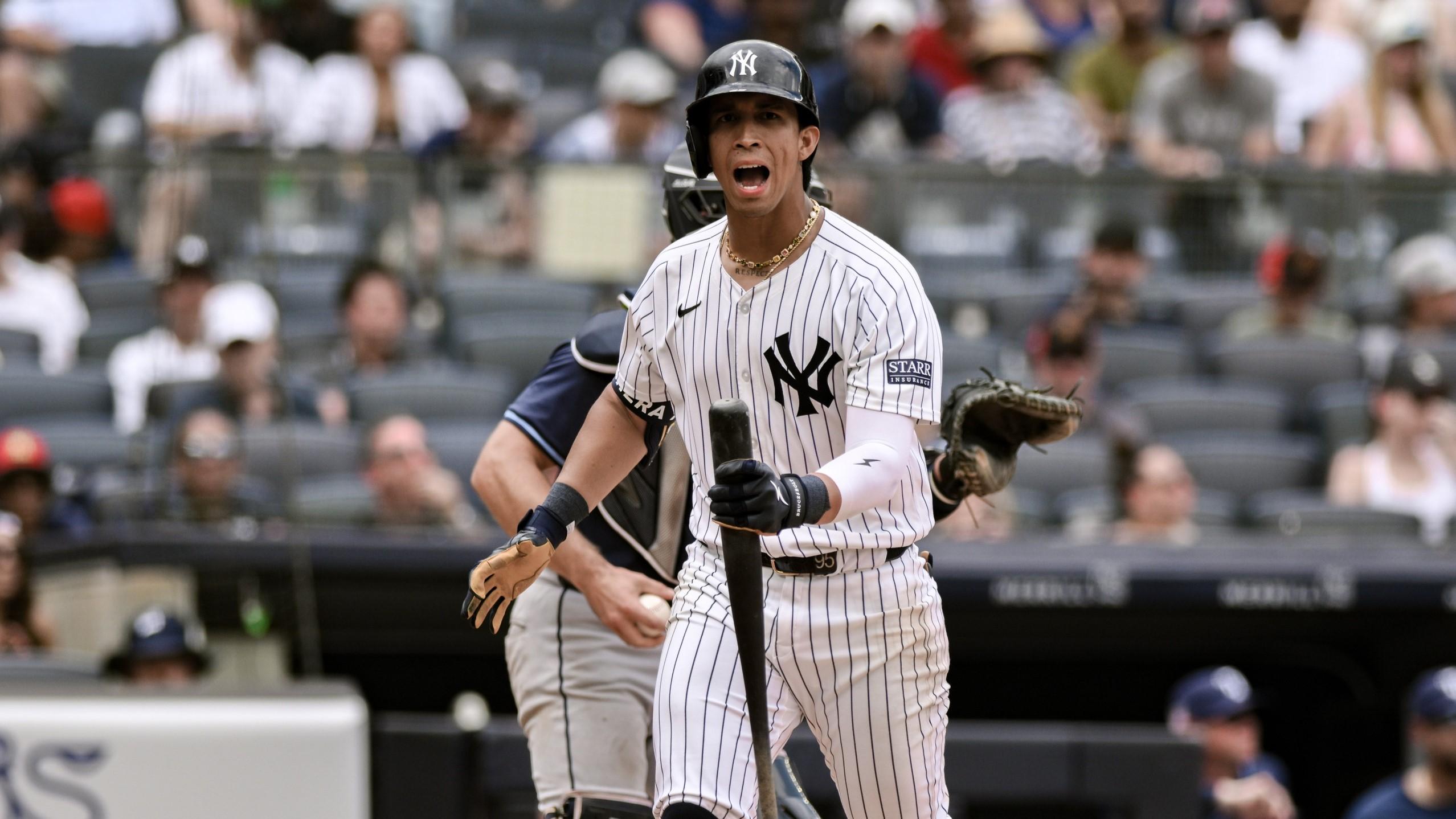 Jul 21, 2024; Bronx, New York, USA; New York Yankees third baseman Oswaldo Cabrera (95) reacts after striking out against the Tampa Bay Rays during the fourth inning at Yankee Stadium.