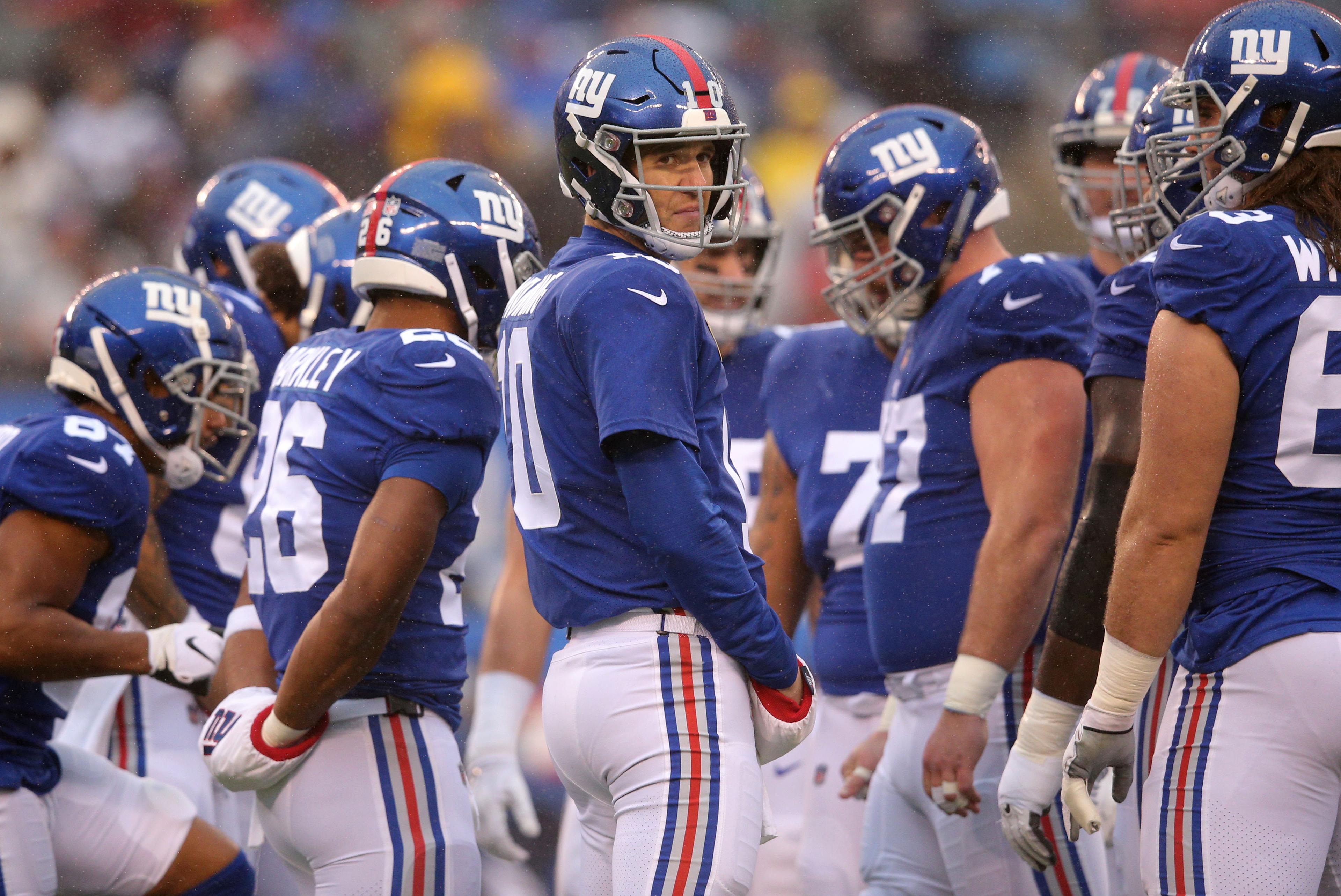 Dec 16, 2018; East Rutherford, NJ, USA; New York Giants quarterback Eli Manning (10) looks back from the huddle during the first quarter against the Tennessee Titans at MetLife Stadium. Mandatory Credit: Brad Penner-USA TODAY Sports