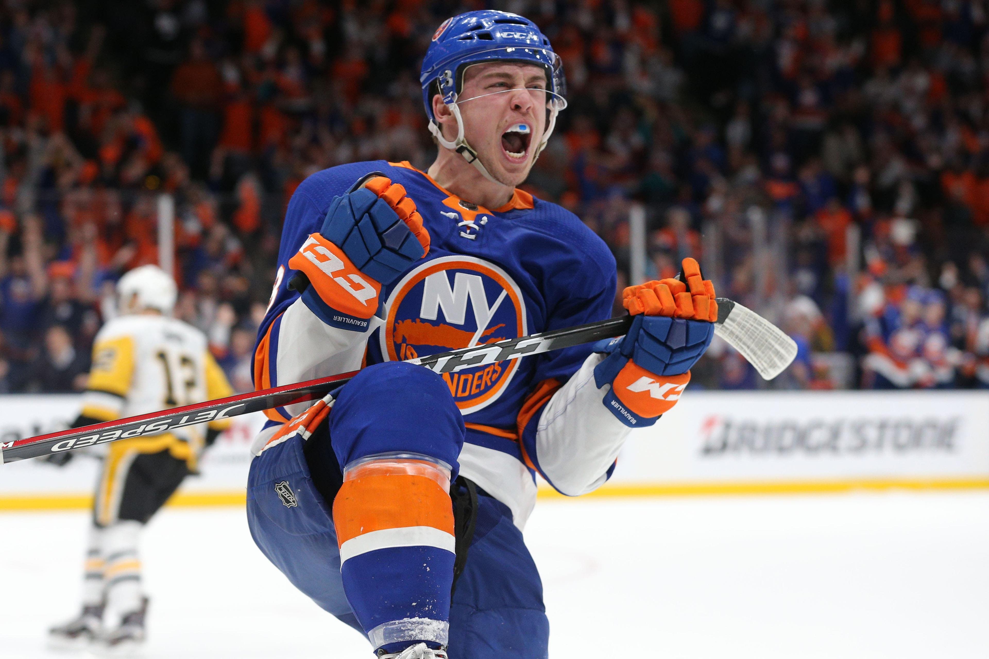 Apr 12, 2019; Uniondale, NY, USA; New York Islanders left wing Anthony Beauvillier (18) celebrates his goal against the Pittsburgh Penguins during the second period of game two of the first round of the 2019 Stanley Cup Playoffs at Nassau Veterans Memorial Coliseum. Mandatory Credit: Brad Penner-USA TODAY Sports / Brad Penner