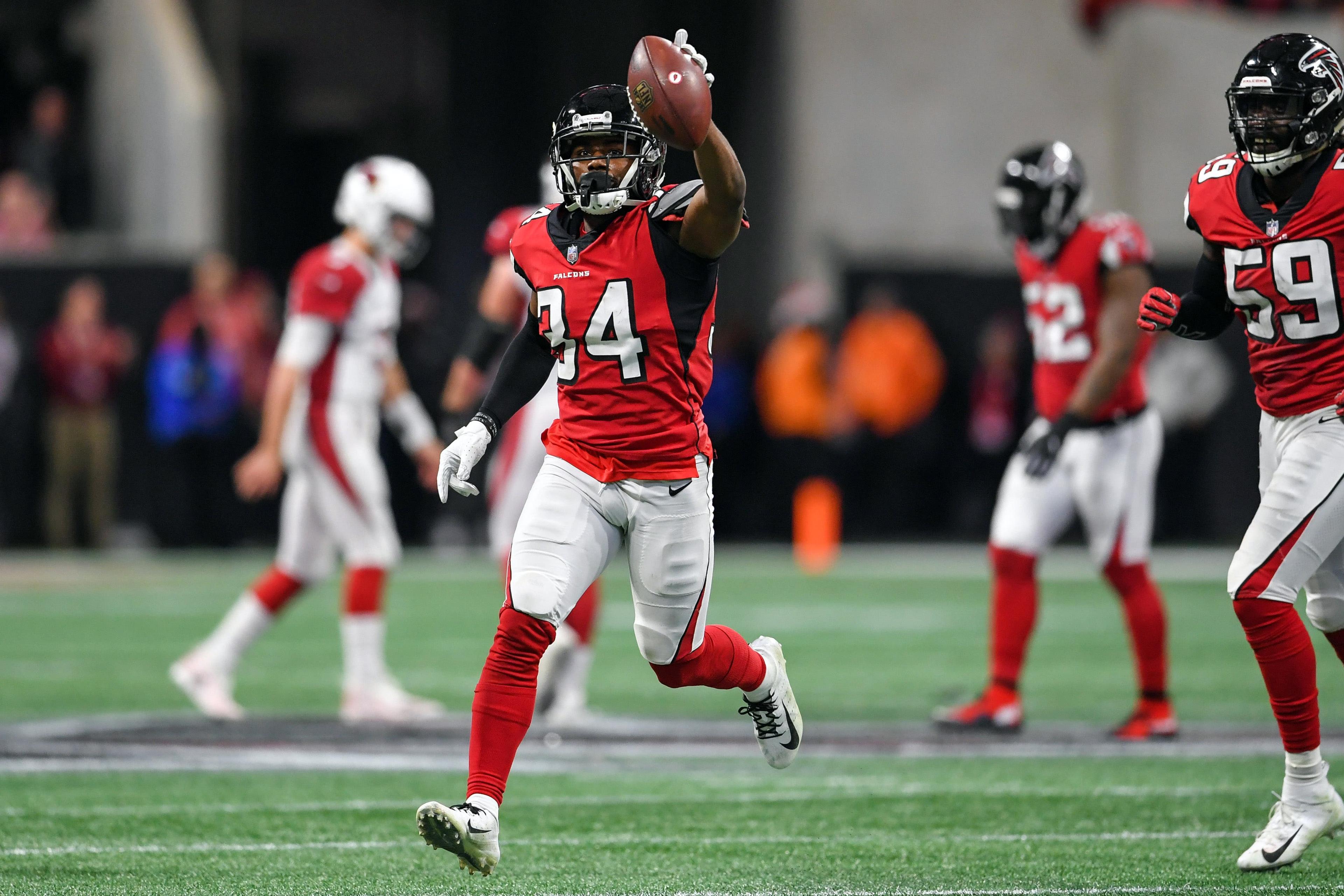 Dec 16, 2018; Atlanta, GA, USA; Atlanta Falcons cornerback Brian Poole (34) reacts after an interception against the Arizona Cardinals during the first half at Mercedes-Benz Stadium. Mandatory Credit: Dale Zanine-USA TODAY Sports / Dale Zanine