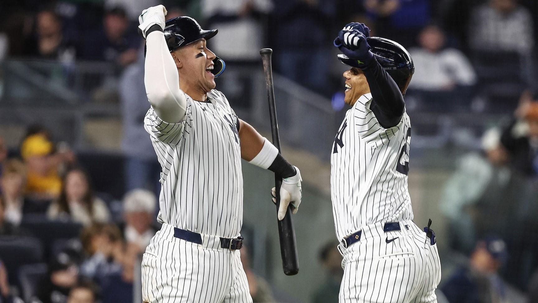 Apr 24, 2024; Bronx, New York, USA; New York Yankees right fielder Juan Soto (22) celebrates with center fielder Aaron Judge (99) after hitting a solo home run in the sixth inning against the Oakland Athletics at Yankee Stadium. / Wendell Cruz-USA TODAY Sports